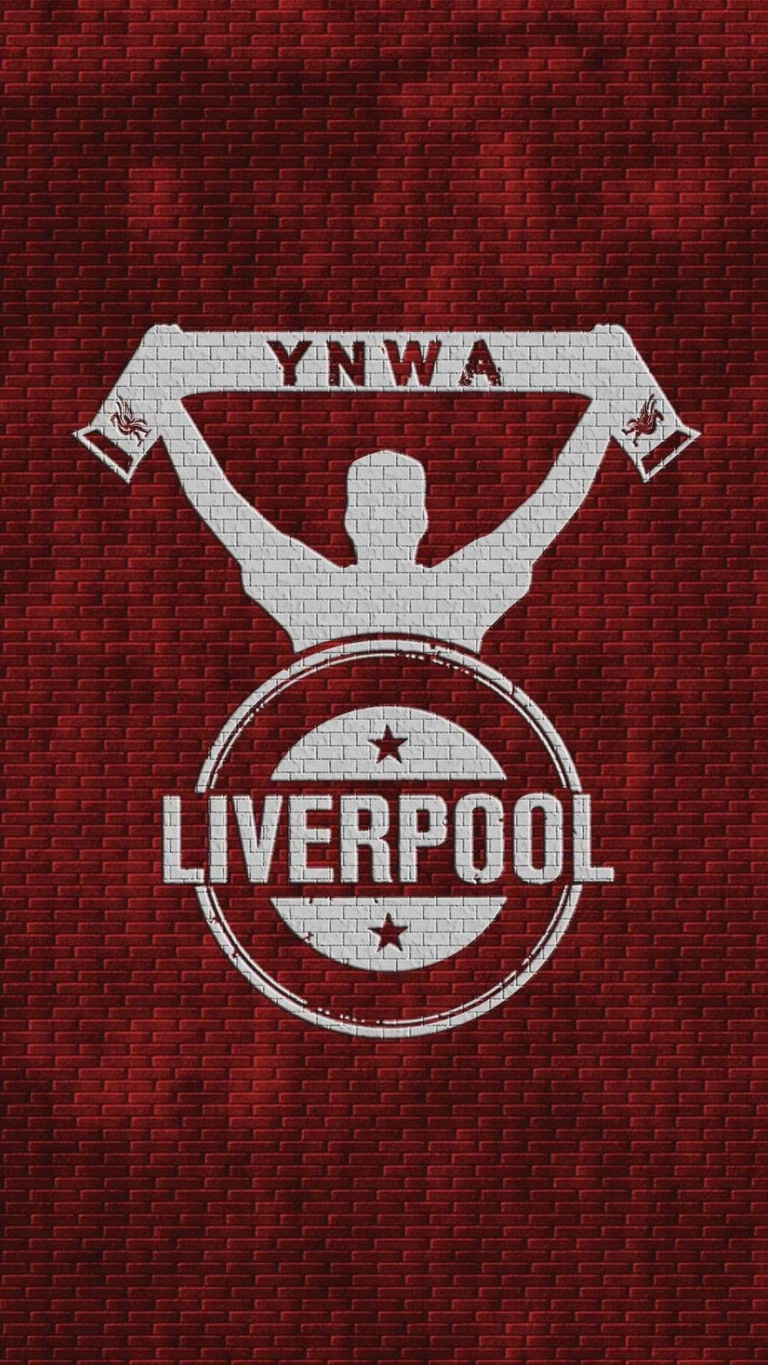 Liverpool FC crest and a fan holding a scarf over YNWA text against a red textured brick wall background.