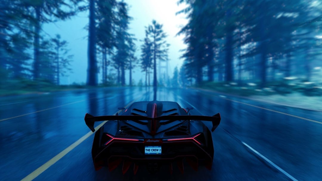 Black Lamborghini Veneno speeding through a misty blue forest on a wet road with glowing red taillights.