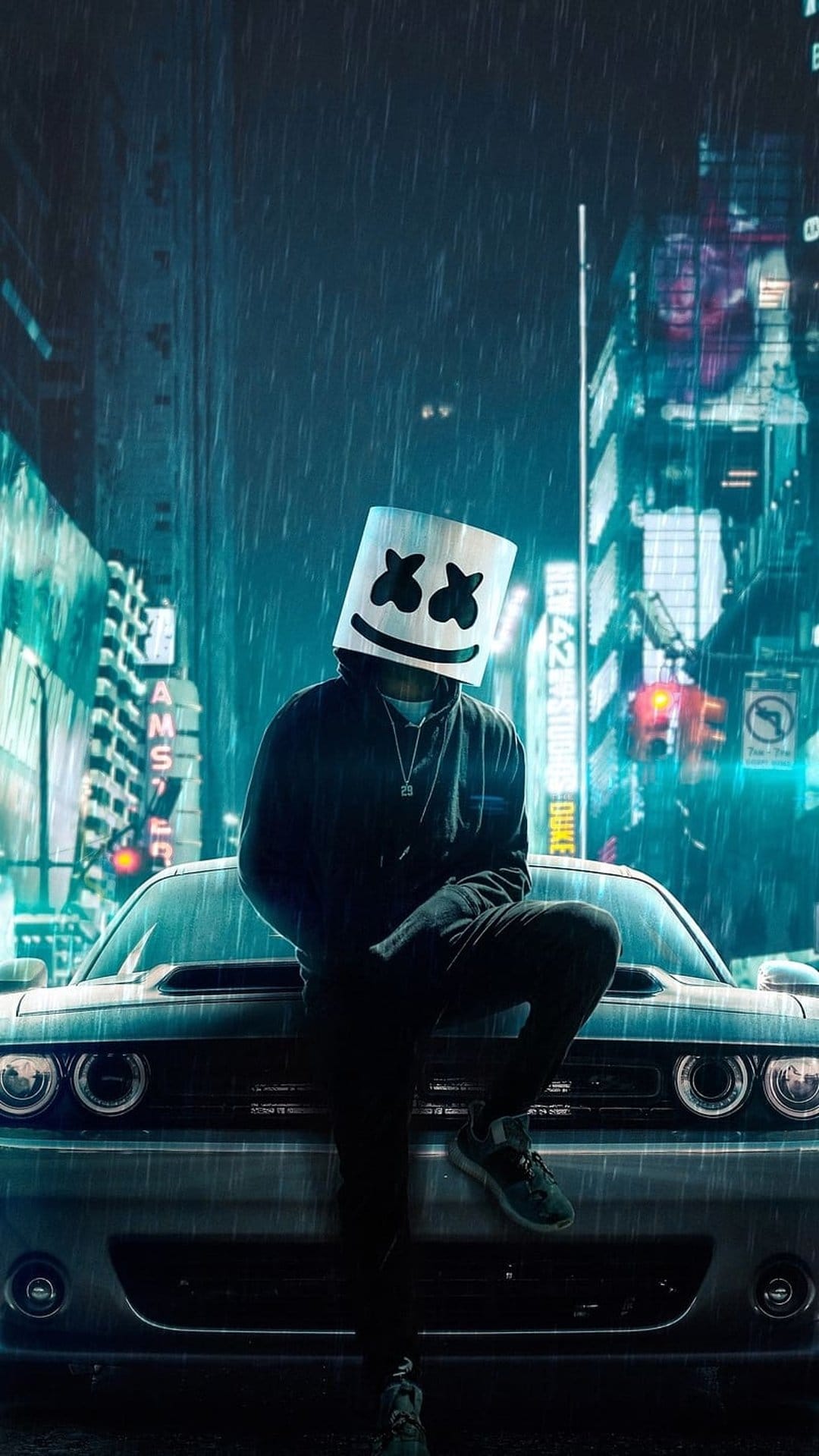 Marshmello in a white helmet sits on a sleek car during a rainy night in a neon city with wet reflections.