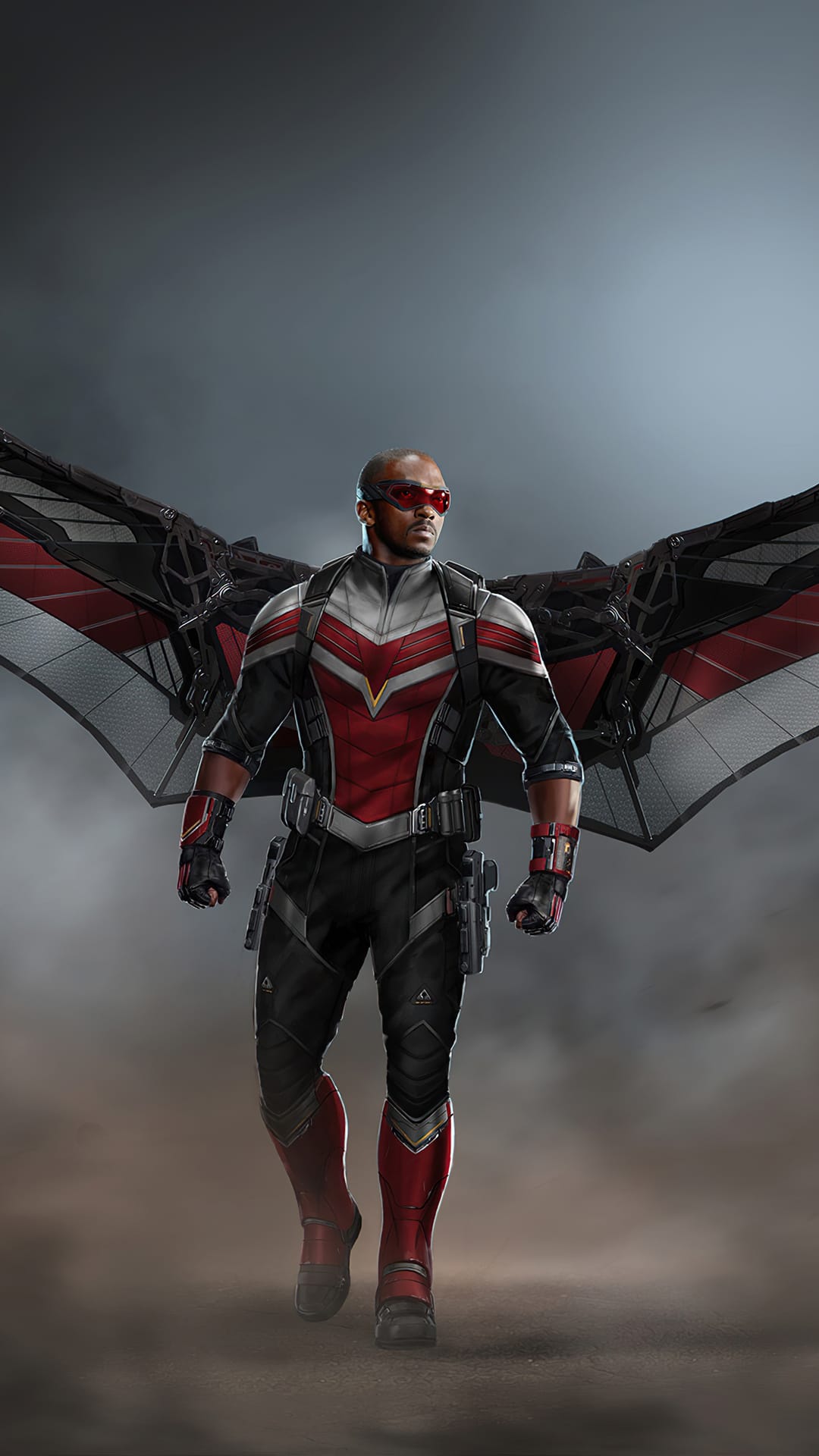 Falcon walks through dust wearing red goggles and a tactical suit with massive mechanical red and white wings.