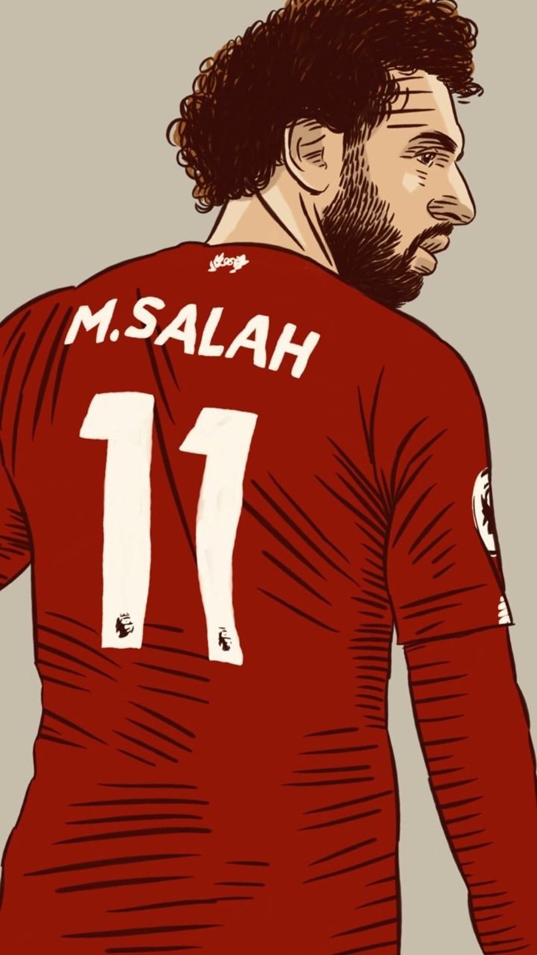 Mohamed Salah in a red jersey showing the name M. Salah and number 11 on his back against a neutral background.