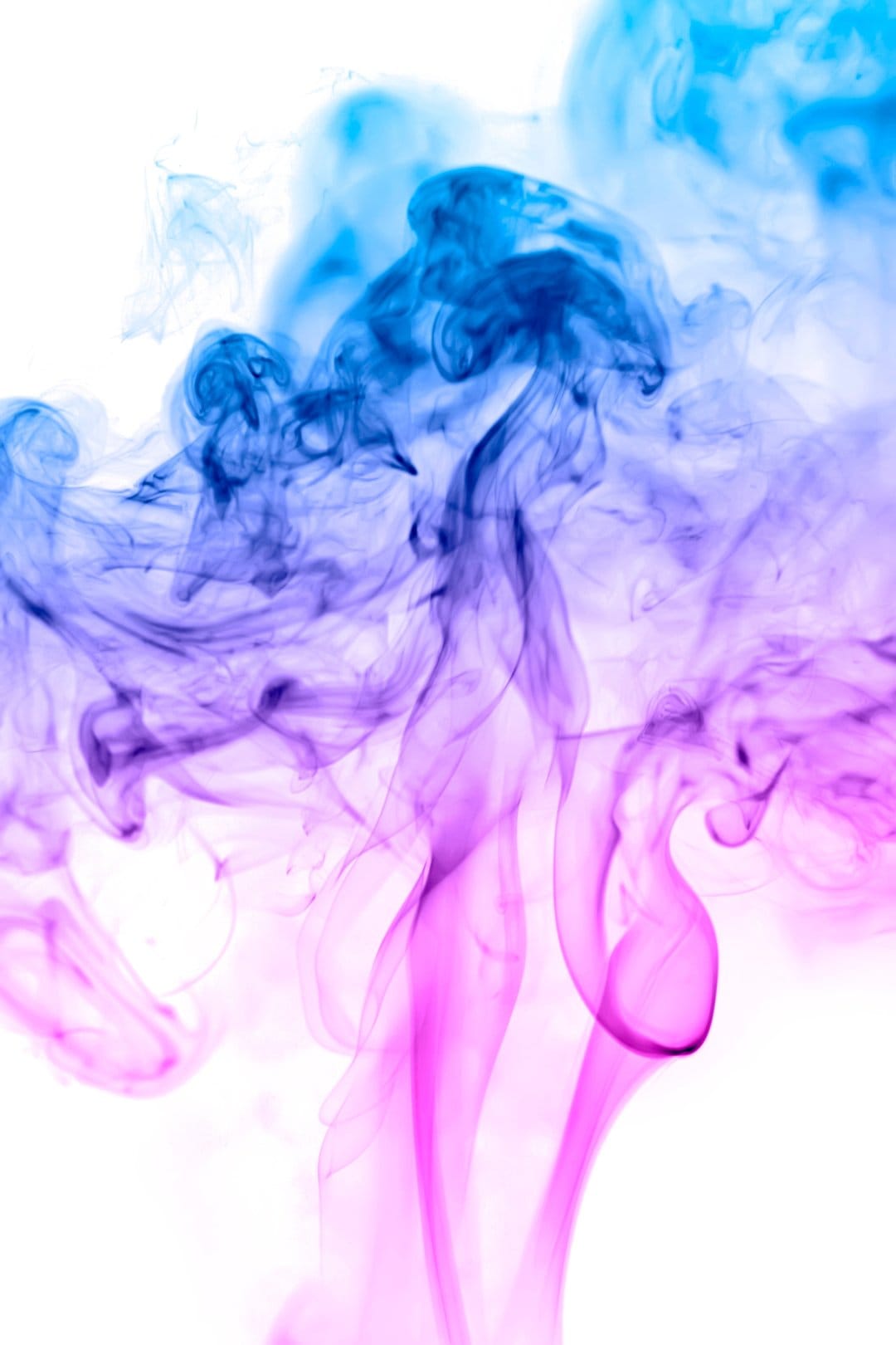 Swirling blue and pink smoke trails against a dark background with soft gradients and ethereal wispy textures.