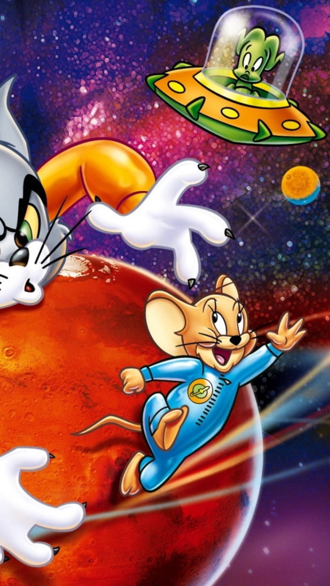 Jerry Mouse in a spacesuit greets a green alien in a UFO while Tom's paw reaches out across a starry galaxy.