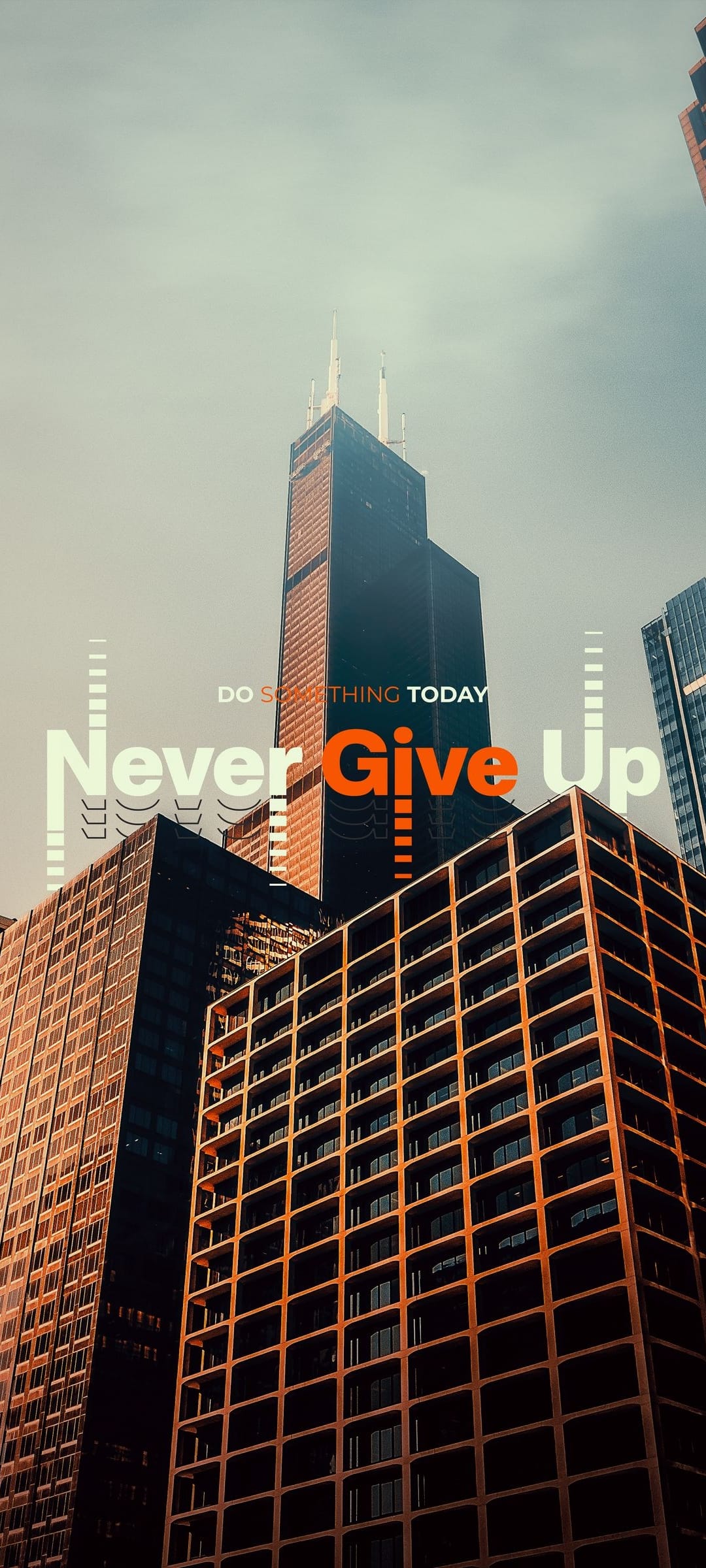 Towering skyscrapers viewed from a low angle with the text Never Give Up centered against a bright blue sky.