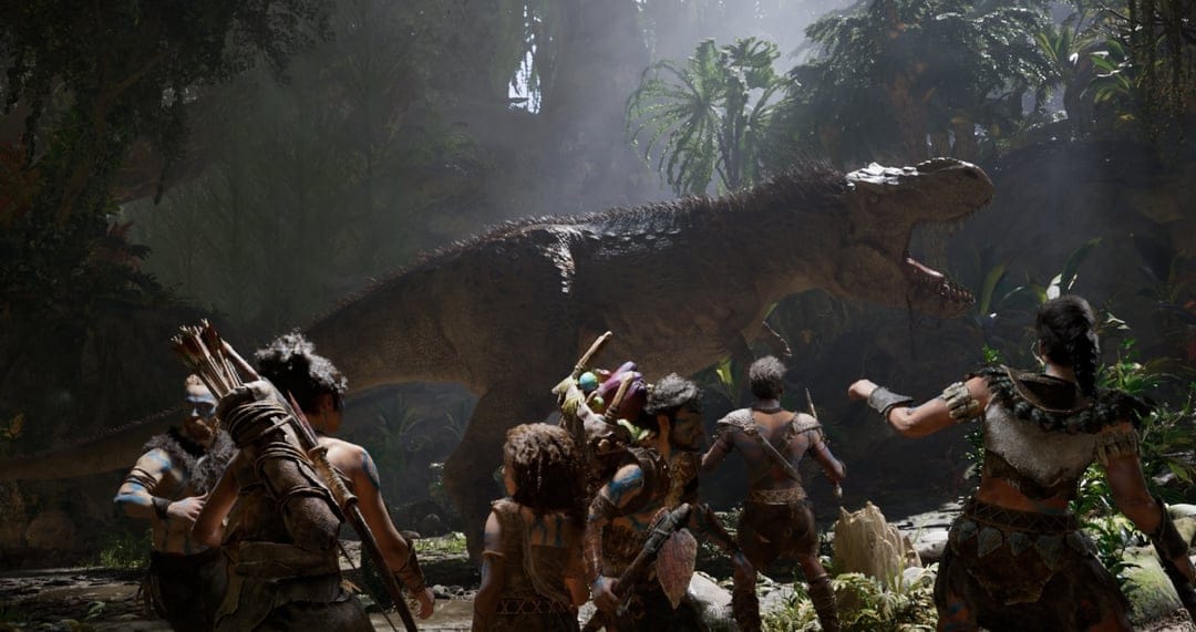 Tribal warriors with blue body paint face a roaring feathered T-Rex in a misty, sunlit prehistoric jungle.