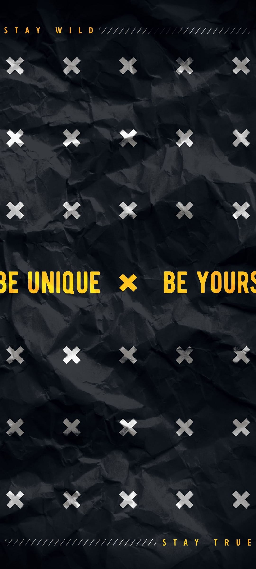 Bold yellow text reads Stay Wild over a dark crumpled paper texture with small white crosses in the background.