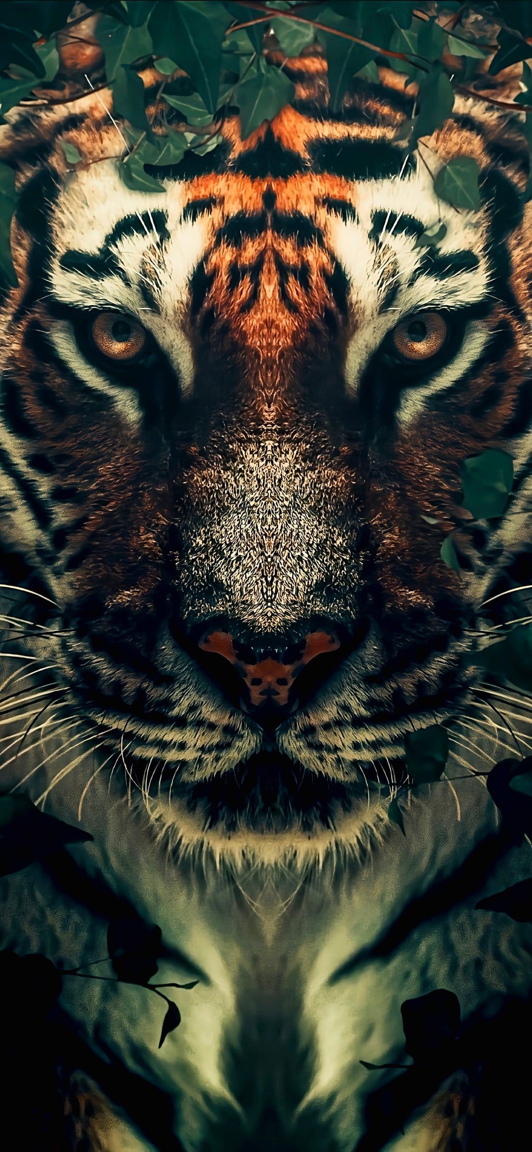 Tiger face with glowing orange eyes and black stripes centered between vibrant green leaves in a close-up portrait.