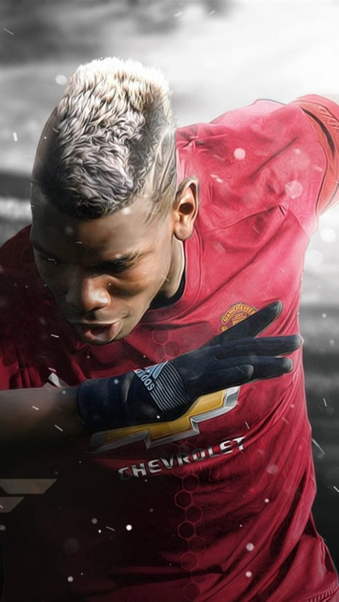 Paul Pogba dabbing in a red Manchester United jersey with a blonde mohawk and black Adidas glove.