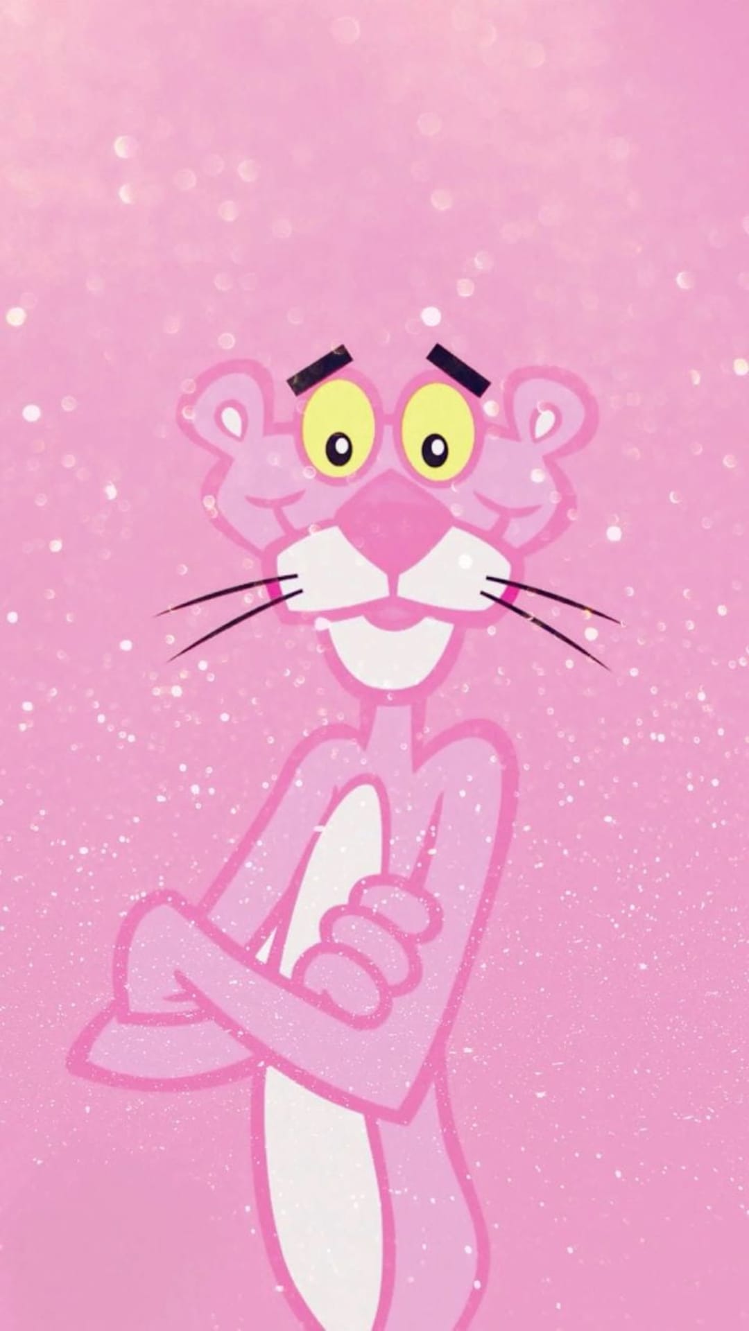 Pink Panther with crossed arms and a smirk stands centered against a soft pink sparkling glitter background.