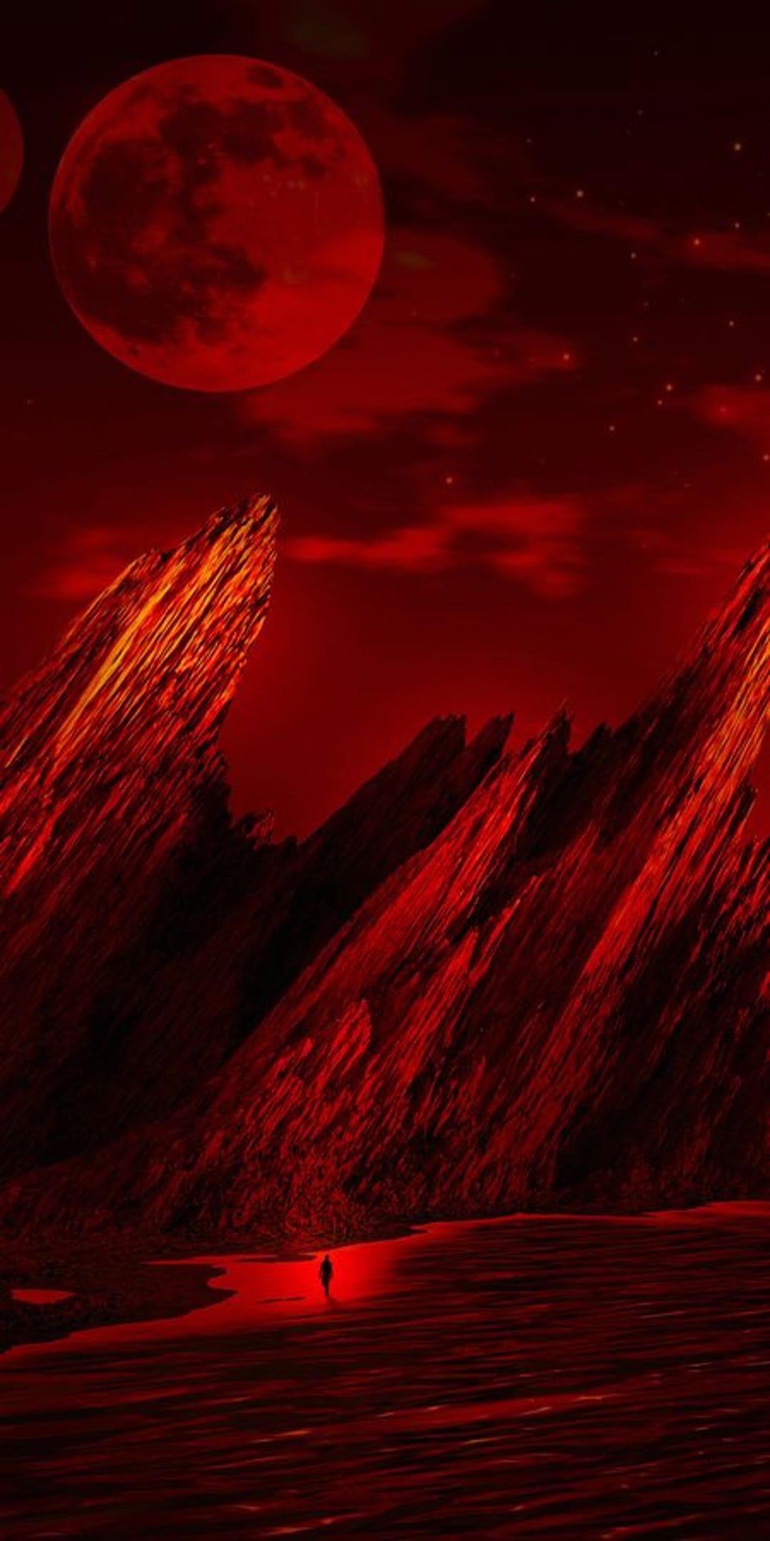 A small human silhouette stands on rippled red ground beneath two massive red moons and sharp mountain peaks.