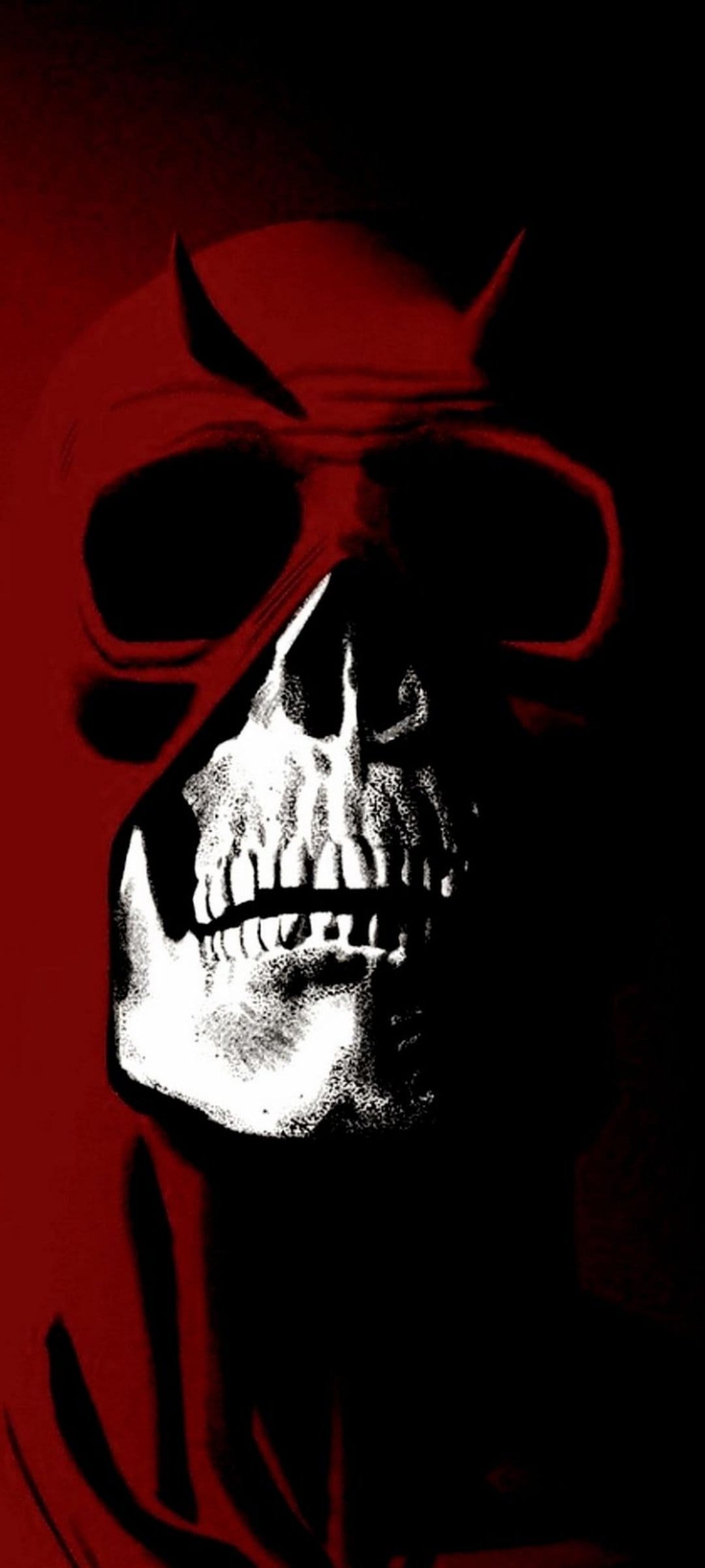 Skeletal face with white eye sockets wearing a red hooded mask with horns against a dark, shadowy backdrop.