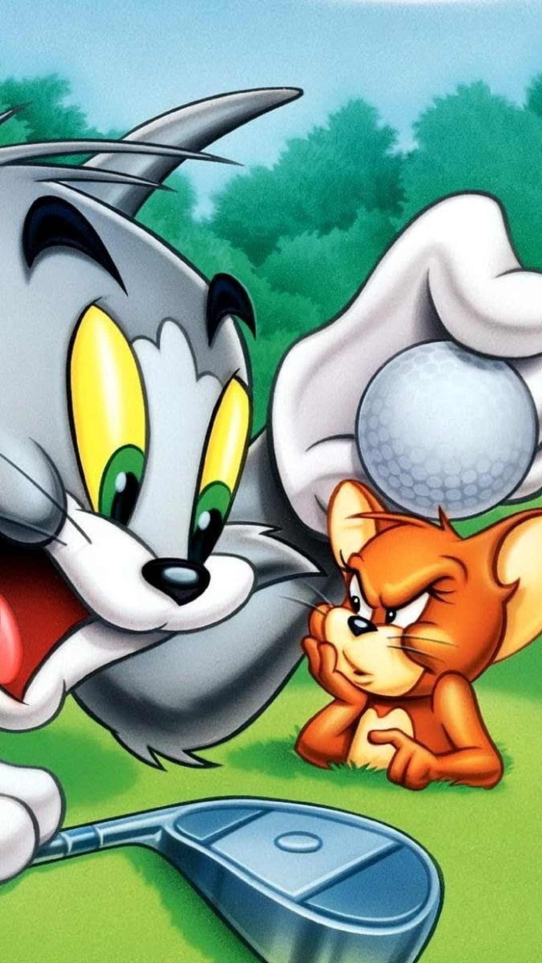 Tom the cat swings a golf club while Jerry the mouse watches from a lush green fairway under a sunny sky.