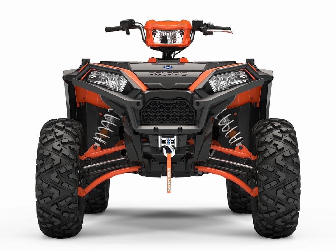 Orange and black Polaris ATV front view with aggressive tires and off-road suspension on a white background.