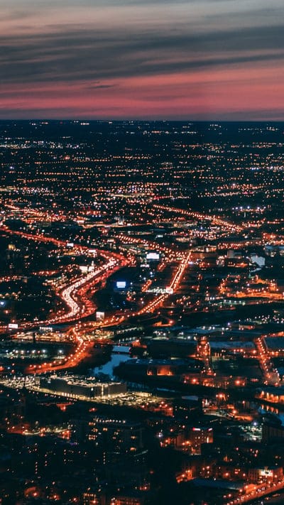 City, night, urban, lights, aerial, cityscape, sprawl, illuminated, grid, metropolis, high-angle, patterns, vibrant, long exposure, dark sky, city life, modern, architecture, urban landscape, glowing