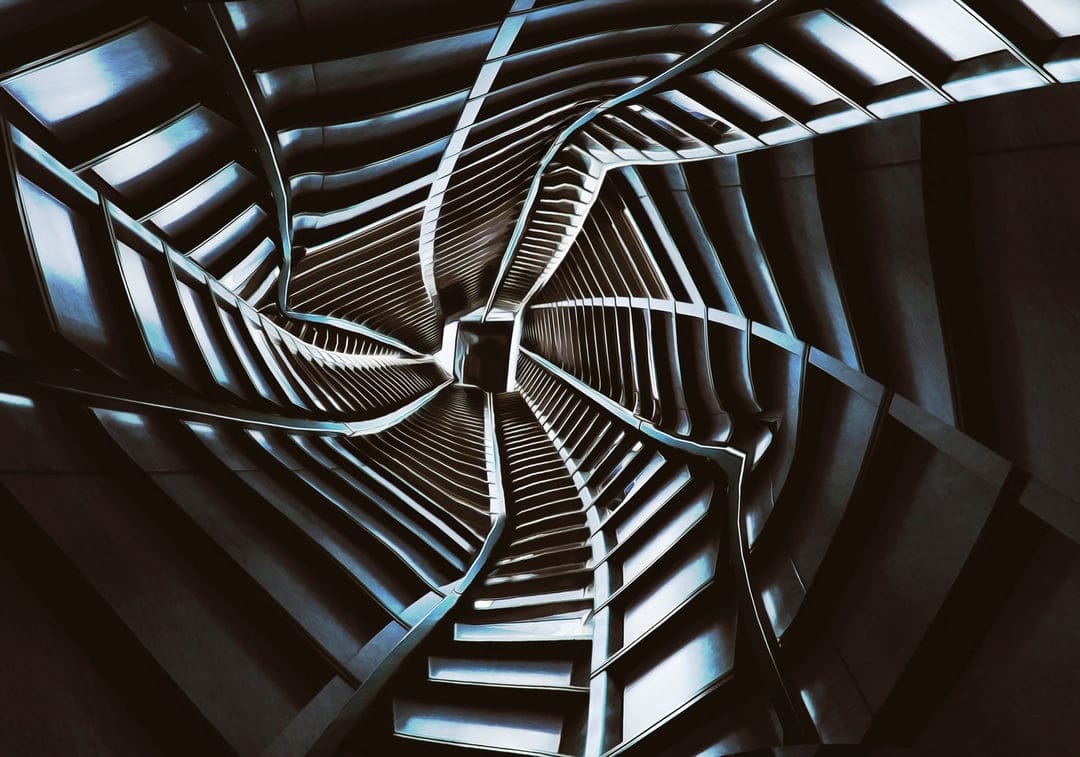 Metallic spiral staircase and glowing panels form a geometric tunnel leading toward a central light source.