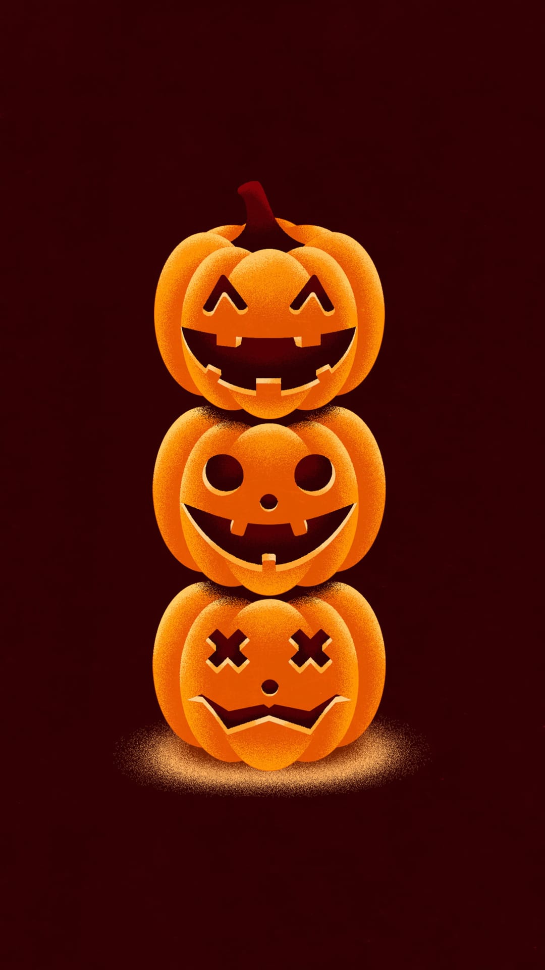 Three stacked jack-o'-lanterns with carved faces glow against a dark maroon background on a vertical screen.