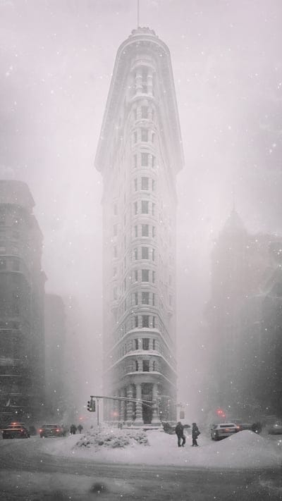 buildings,columns,snow,winter,street,silhouettes
