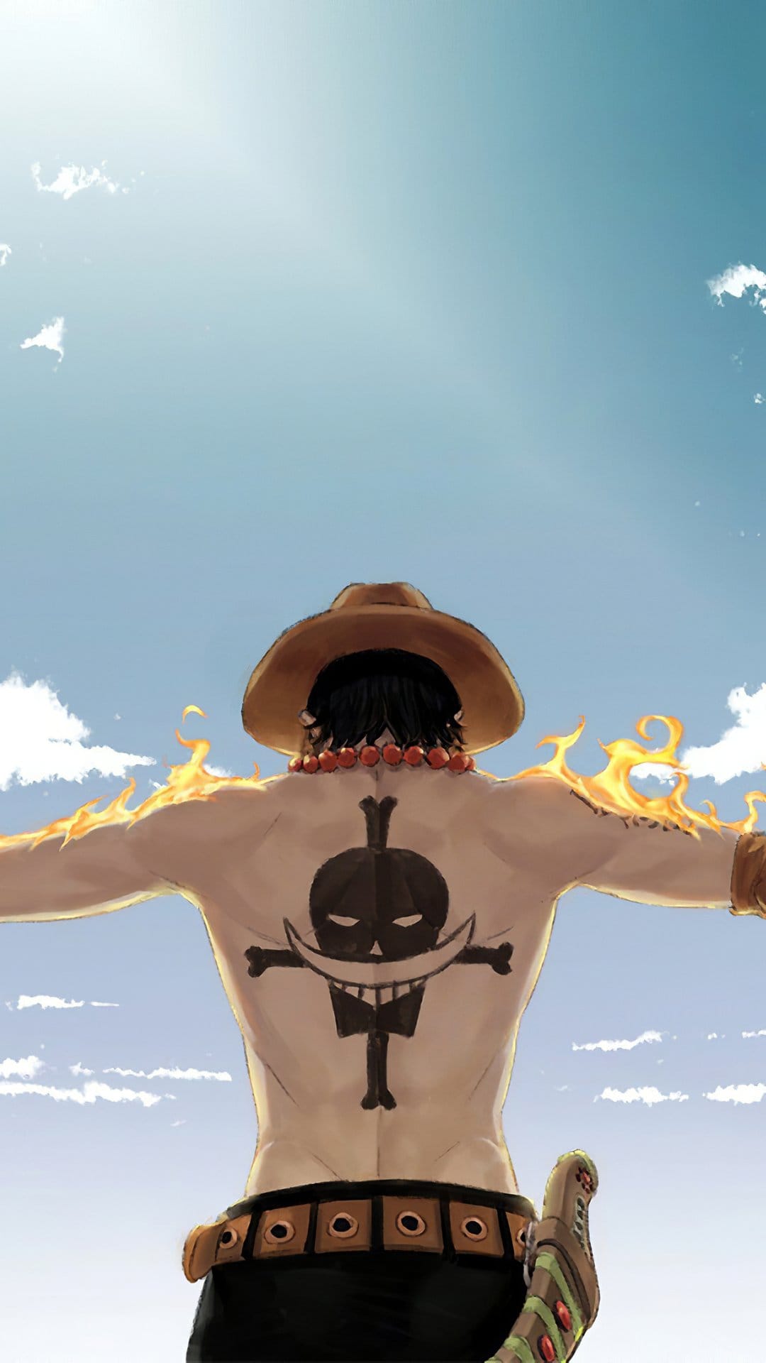 Portgas D. Ace from behind shows a large back tattoo and flaming shoulders against a bright blue cloudy sky.