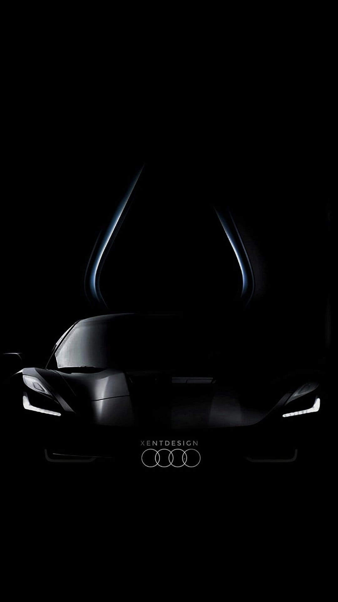 Audi concept car with open butterfly doors sits in darkness, featuring sharp lines and a glowing front logo.