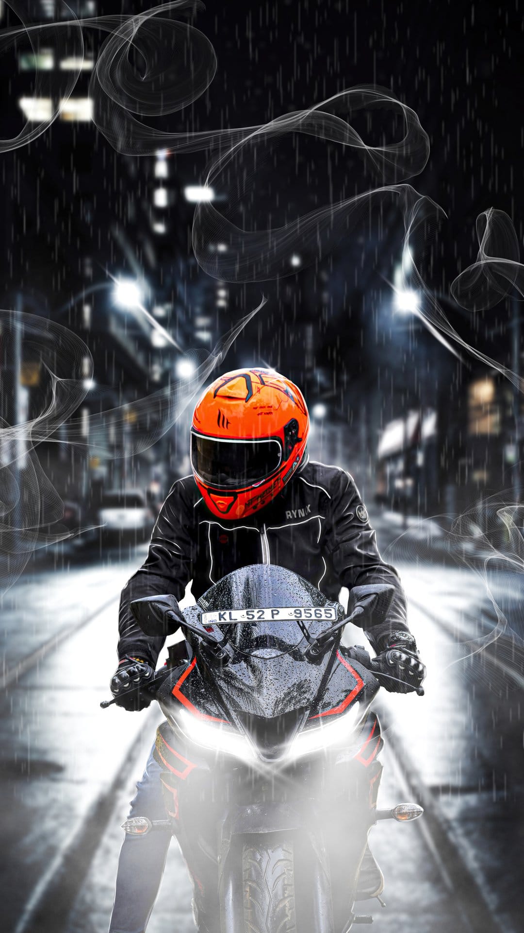 Motorcyclist in an orange helmet riding a bike on a rainy night street with glowing headlights and city bokeh.