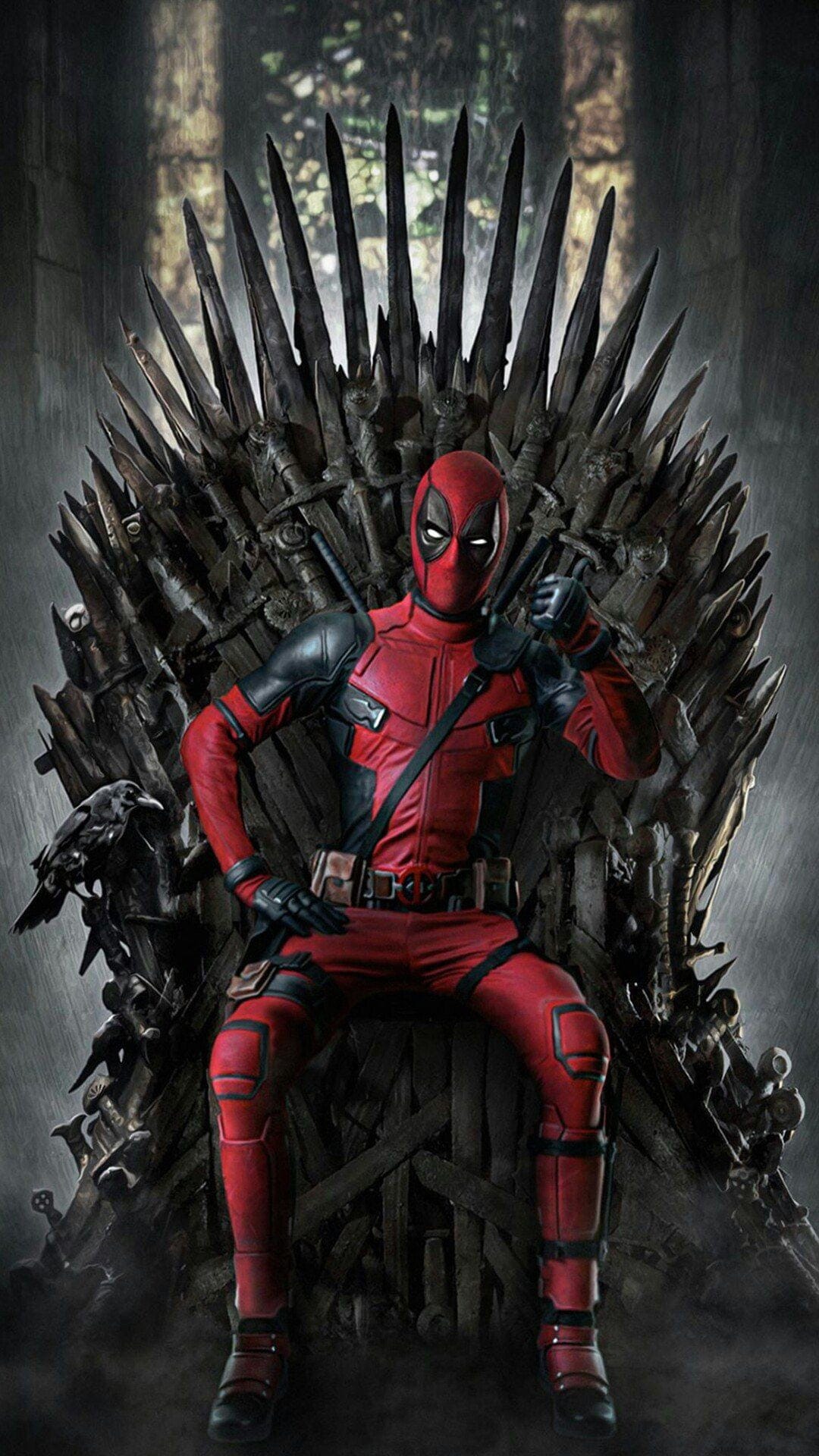 Deadpool in a red suit sits on the Iron Throne made of swords with a black raven perched on a jagged metal blade.