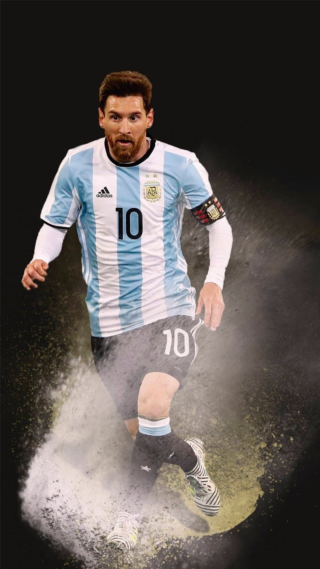 Lionel Messi runs in an Argentina jersey with dust clouds rising from his feet against a soft stadium blur.