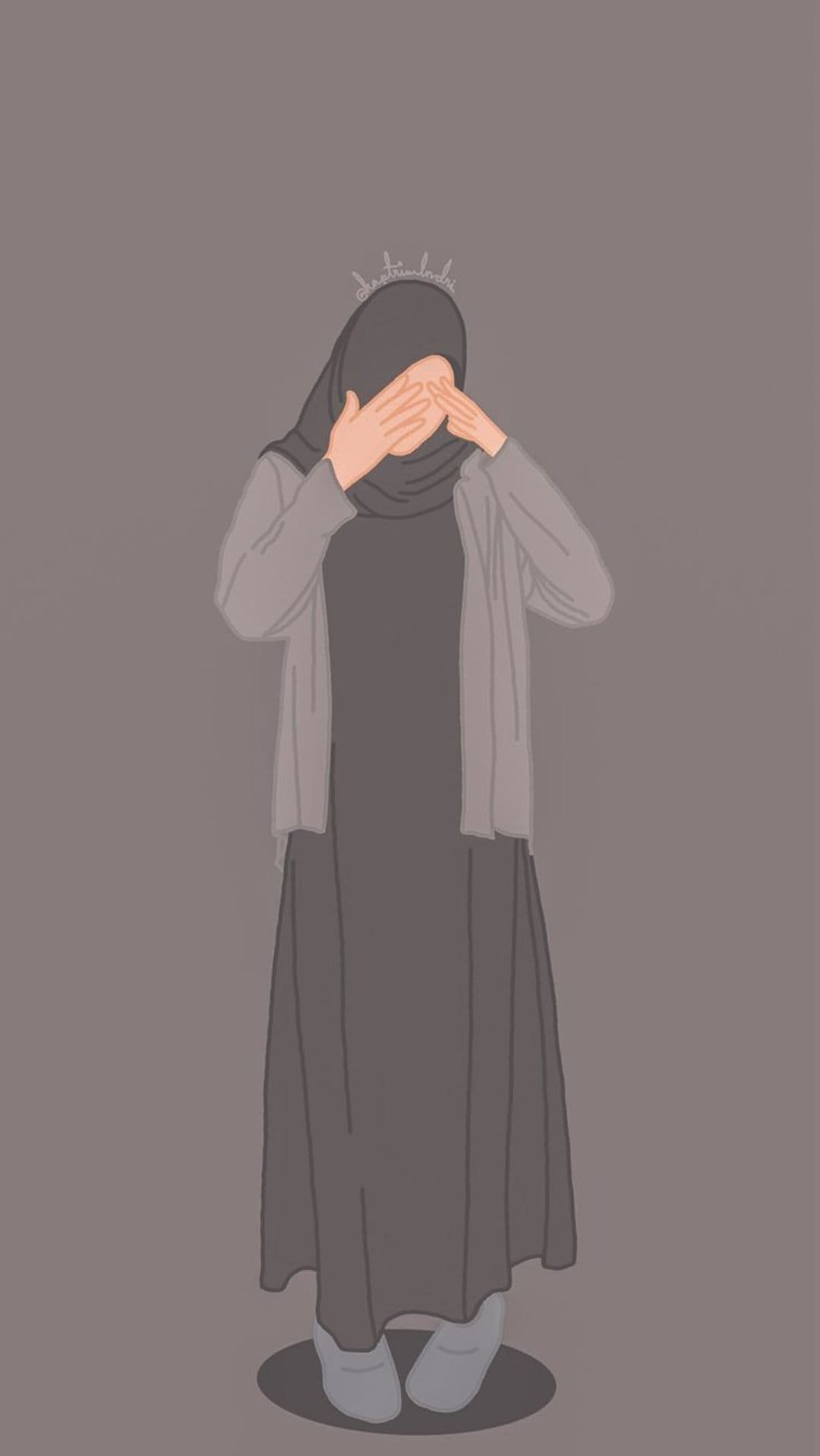 Young woman in a grey hijab covers her eyes with her hands while wearing a tiny silver crown on her head.