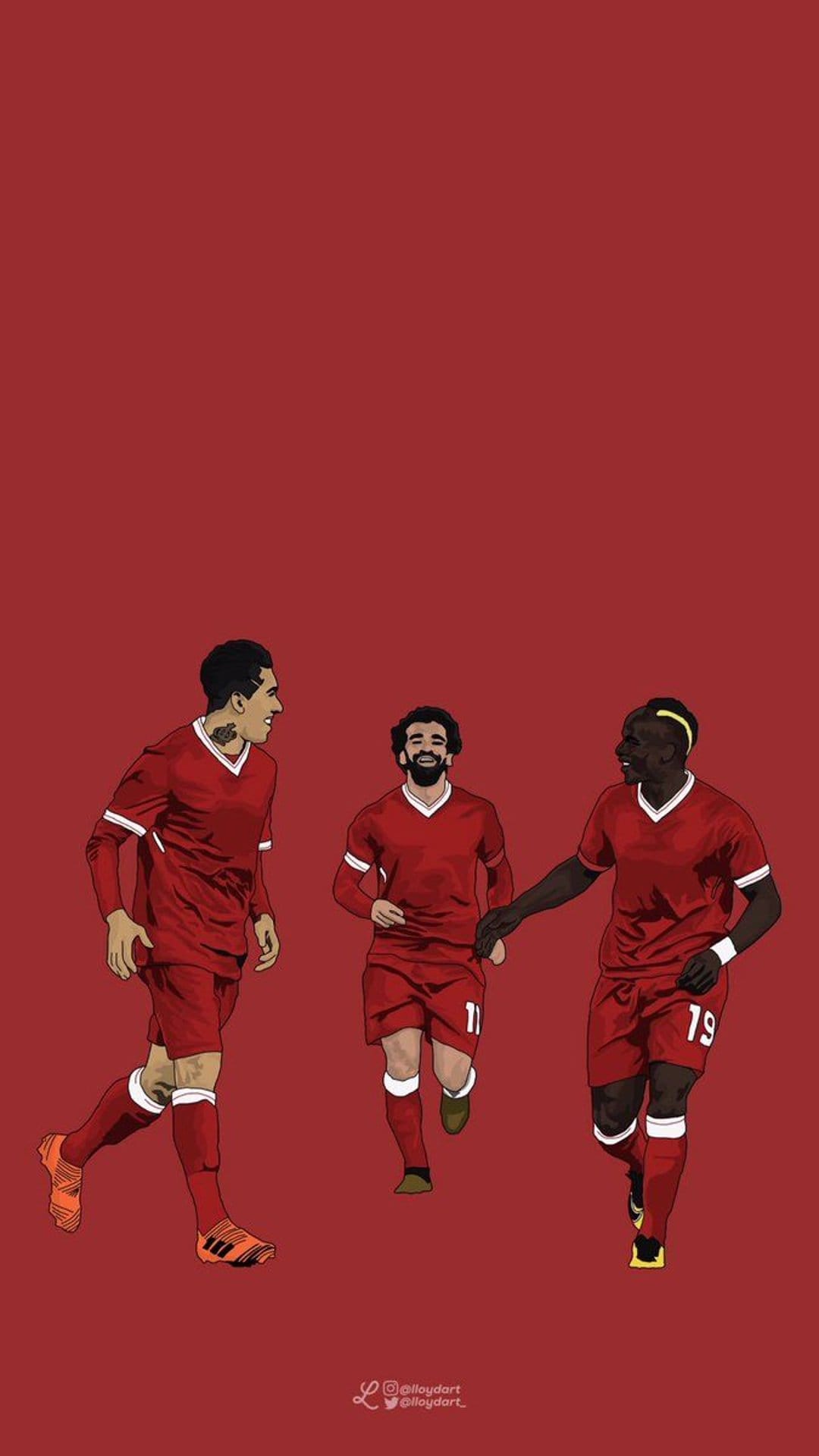 Mohamed Salah, Roberto Firmino, and Sadio Mane wearing red Liverpool home kits against a solid crimson backdrop.