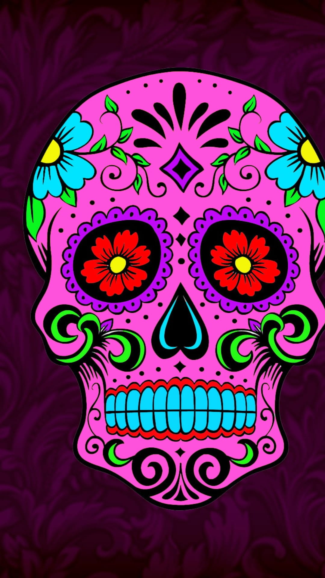 Pink sugar skull with blue and red floral patterns on the forehead and eyes against a vibrant background.