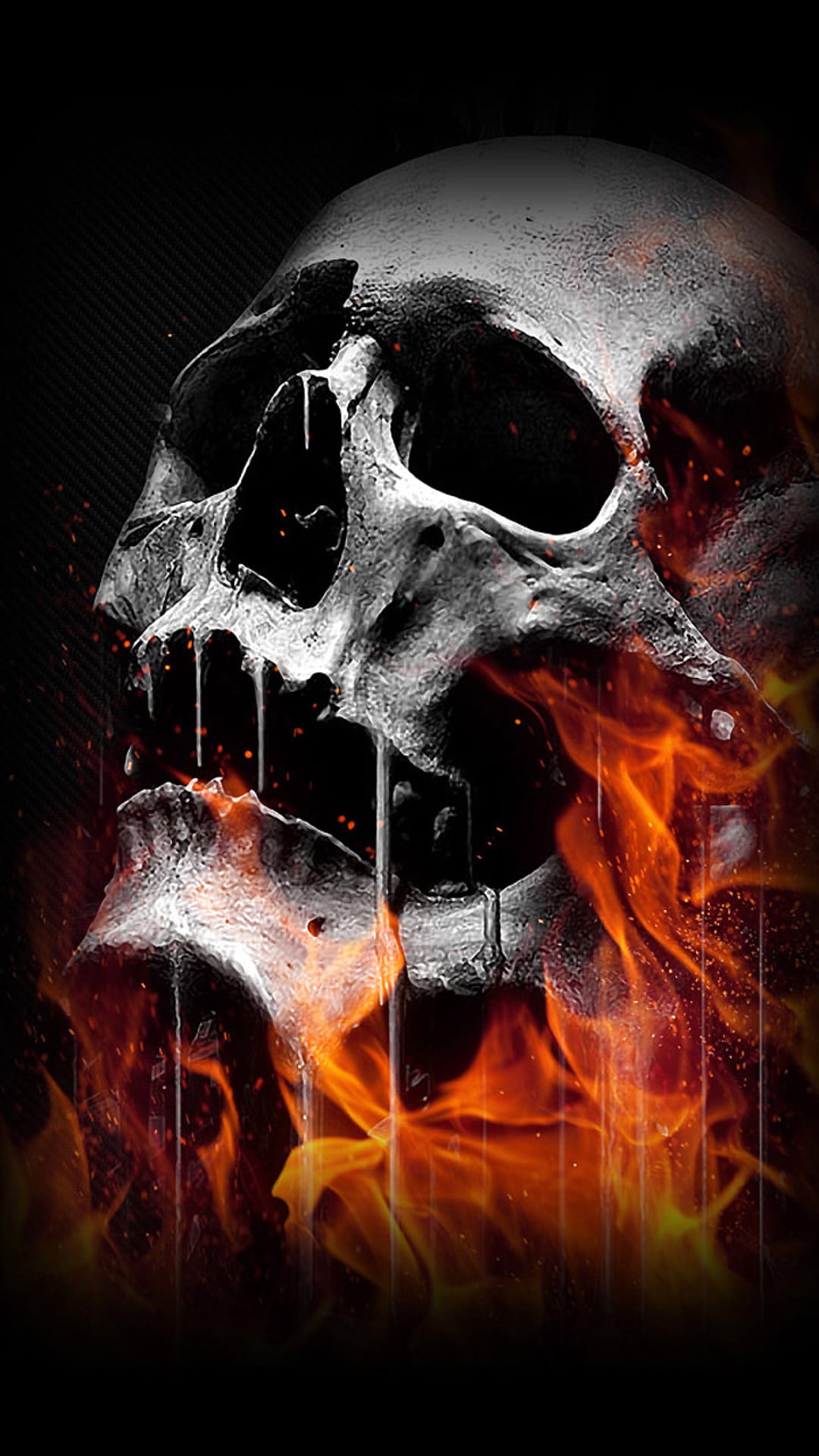 Human skull engulfed in dripping orange and red flames against a black background with glowing embers.