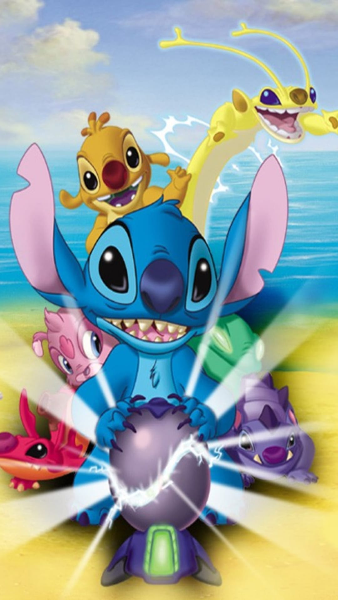 Stitch and colorful alien experiments stand on a sunny tropical beach with blue ocean waves and a bright sky.