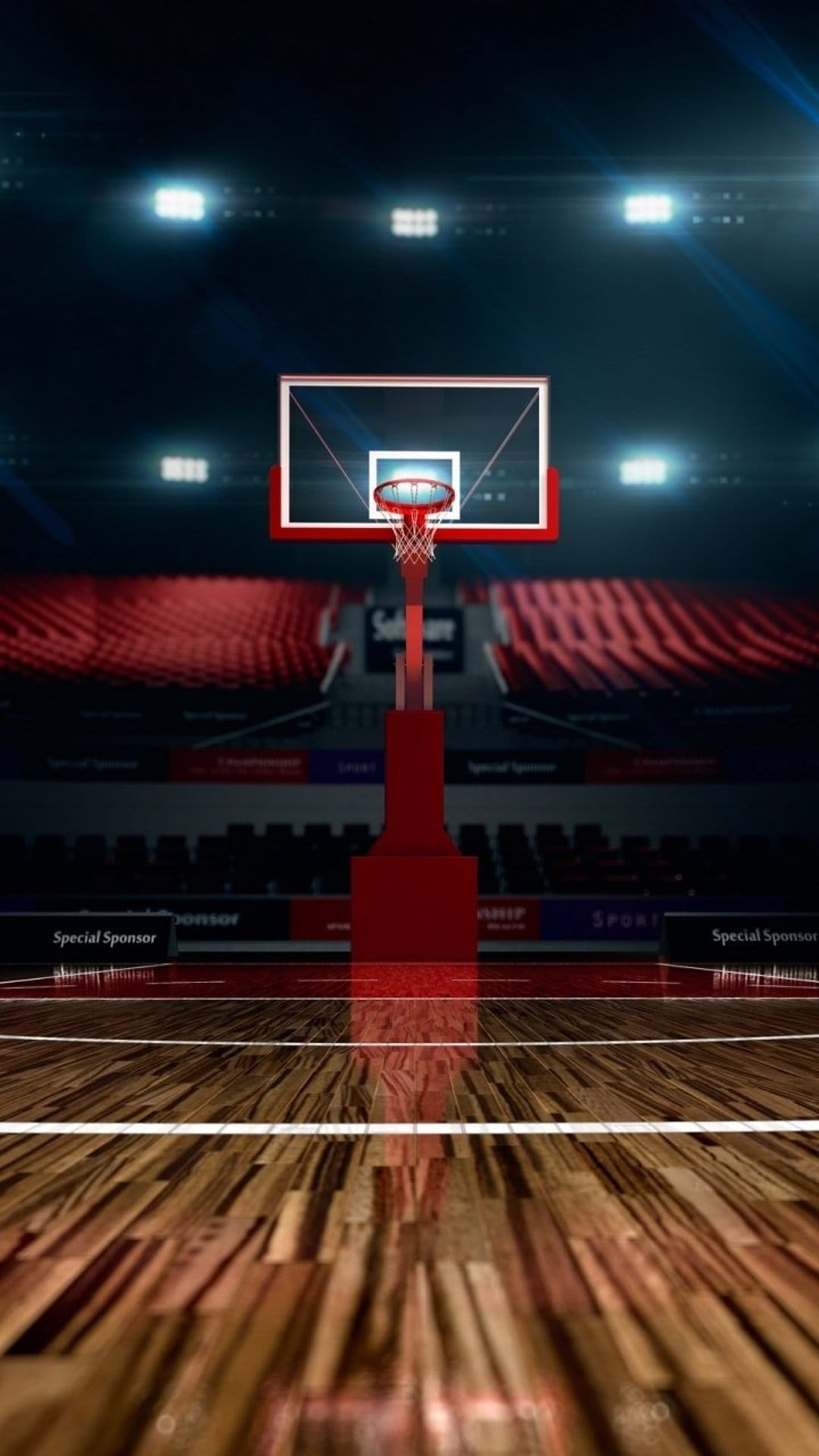 Basketball hoop and backboard centered over a polished wooden court with rows of red stadium seats behind.