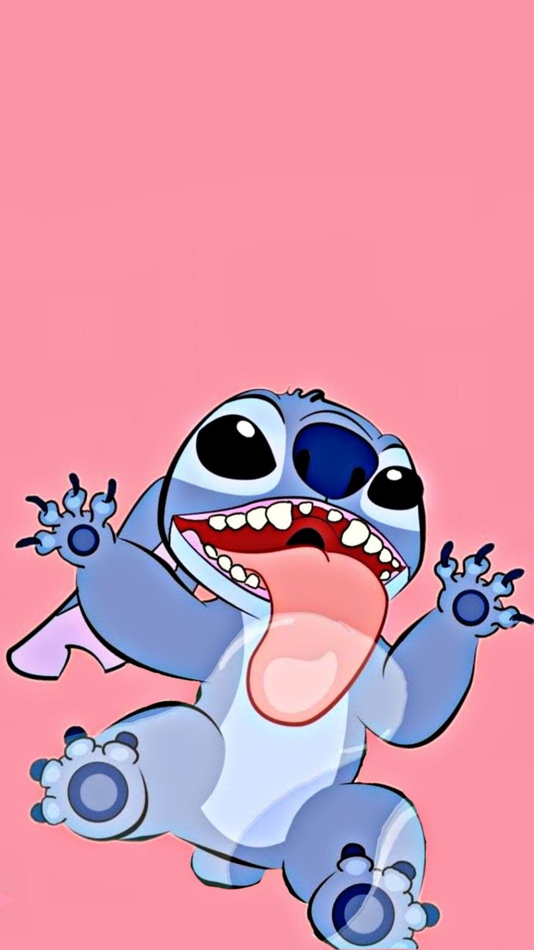 Stitch with his tongue out and limbs splayed against a solid pink background in a playful cartoon pose.