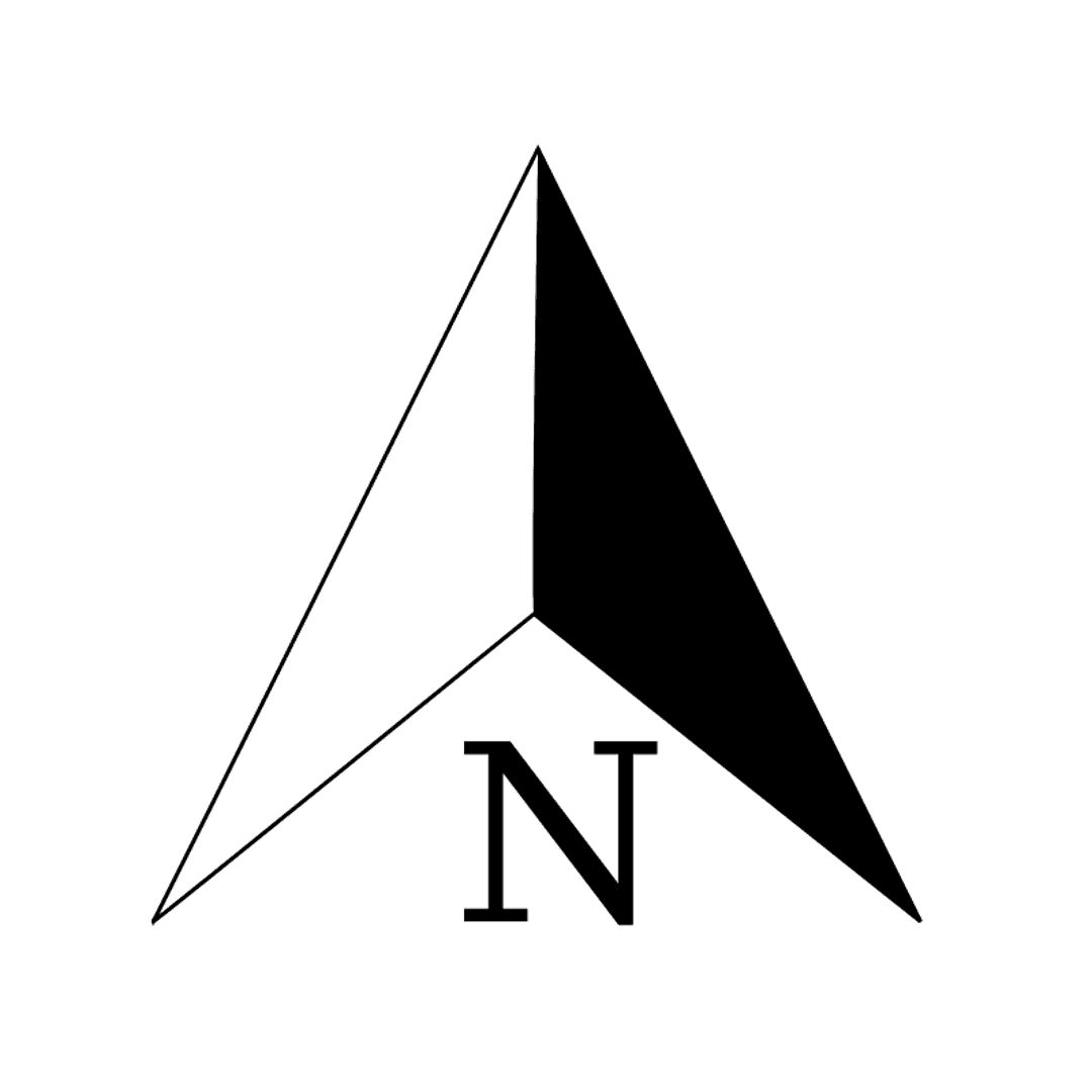 North arrow compass rose symbol featuring bold black lines and a circular frame on a white background.