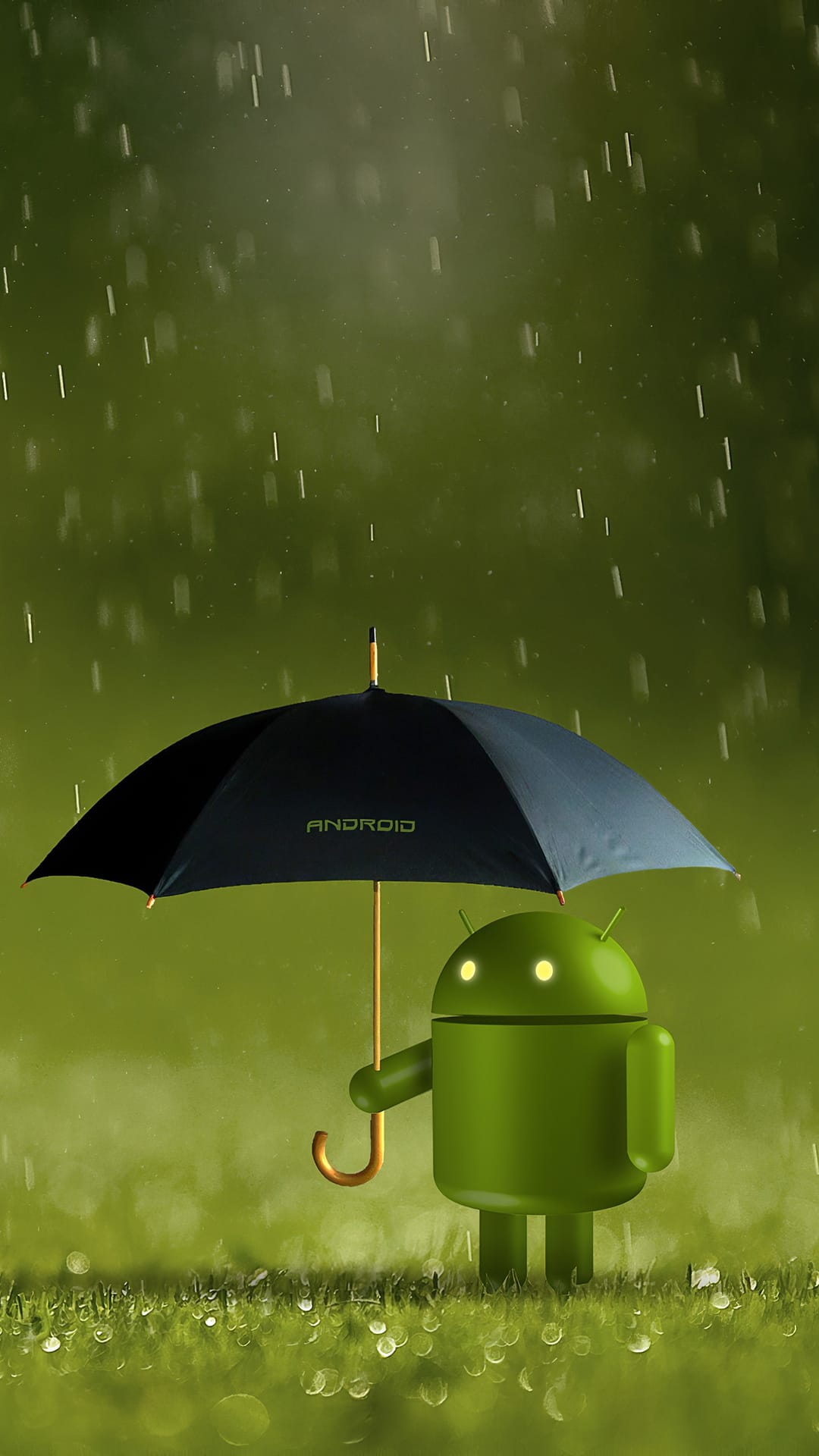 Green Android robot holds a black umbrella on wet grass with falling raindrops and a blurred forest background.