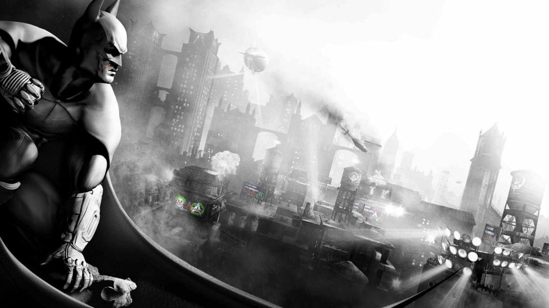 Batman crouched on a ledge overlooking a foggy Gothic city with searchlights and airships in black and white.