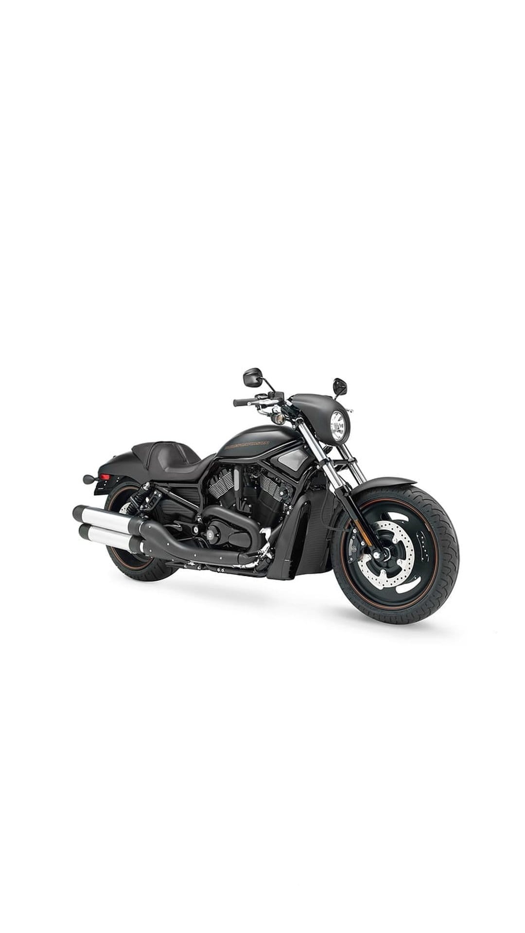 Black cruiser motorcycle featuring a detailed v-twin engine, chrome accents, and leather seat in a moody setting.