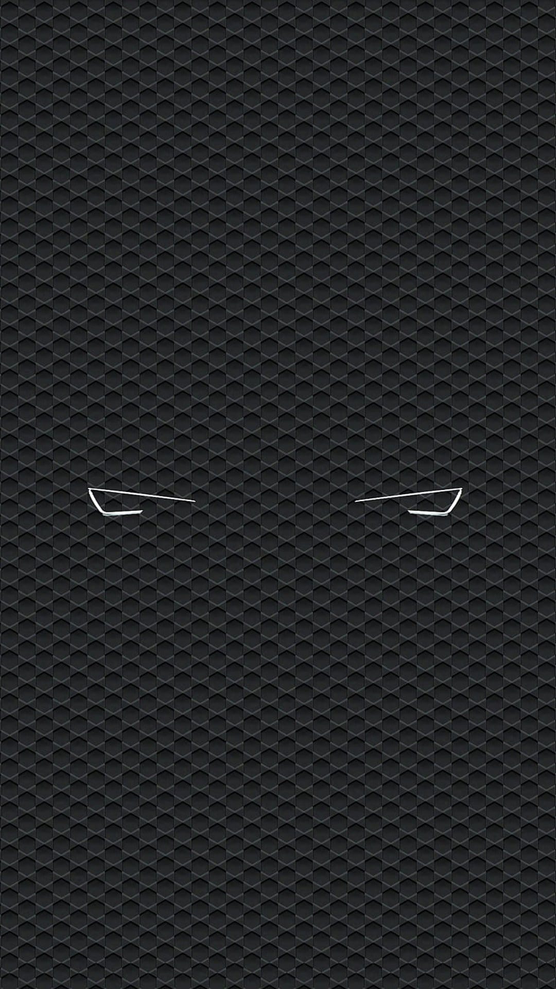 Angular white lines forming eyes contrast against a dark black hexagonal honeycomb textured background.