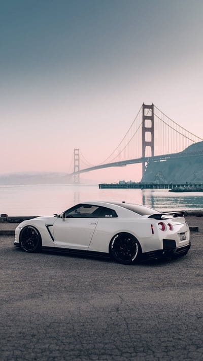GTR with a view, nissan, white, car, supercar sports, america, sunset, bridge, mobile wallpaper, android wallpaper, iPhone wallpaper, phone wallpaper