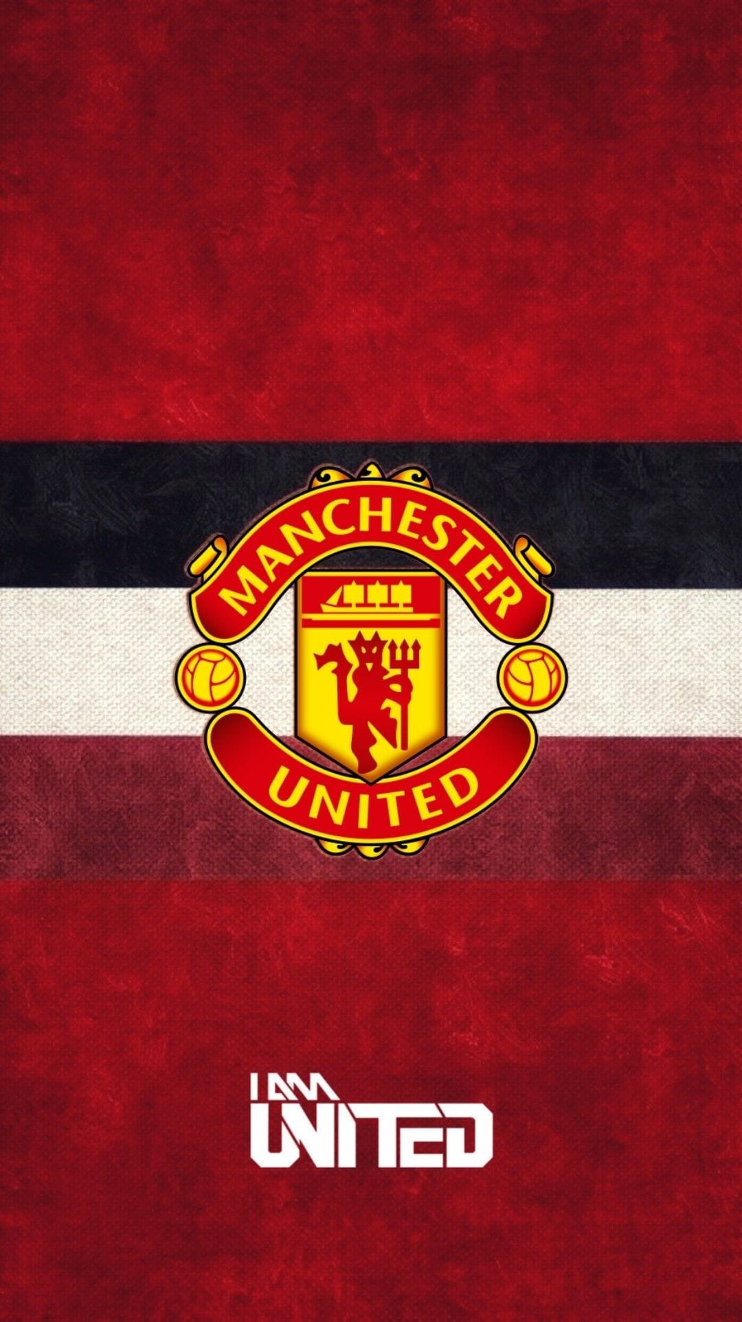 Manchester United crest centered on red, black, and white horizontal stripes with I AM UNITED text at the bottom.