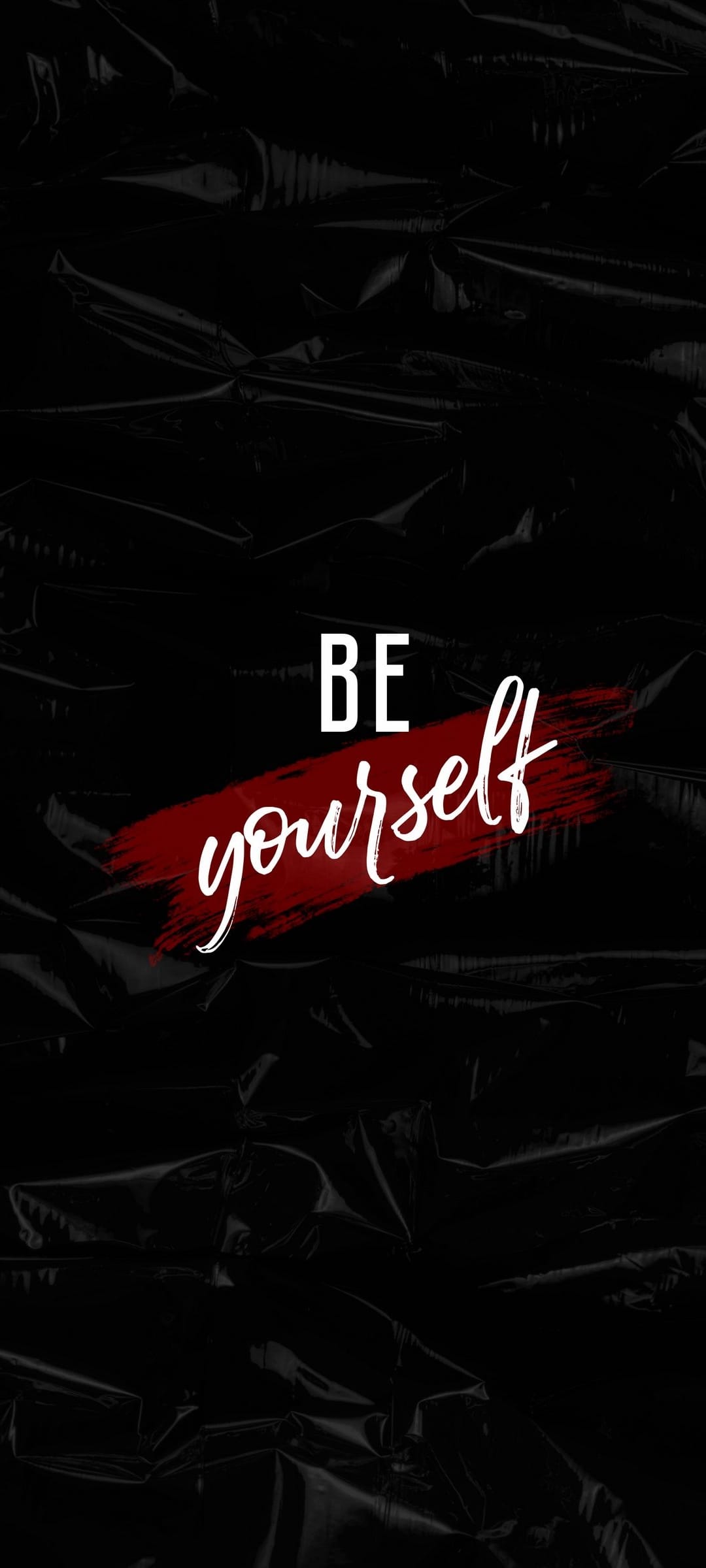 White BE yourself text with a vibrant red paint stroke centered on a gritty black textured background.
