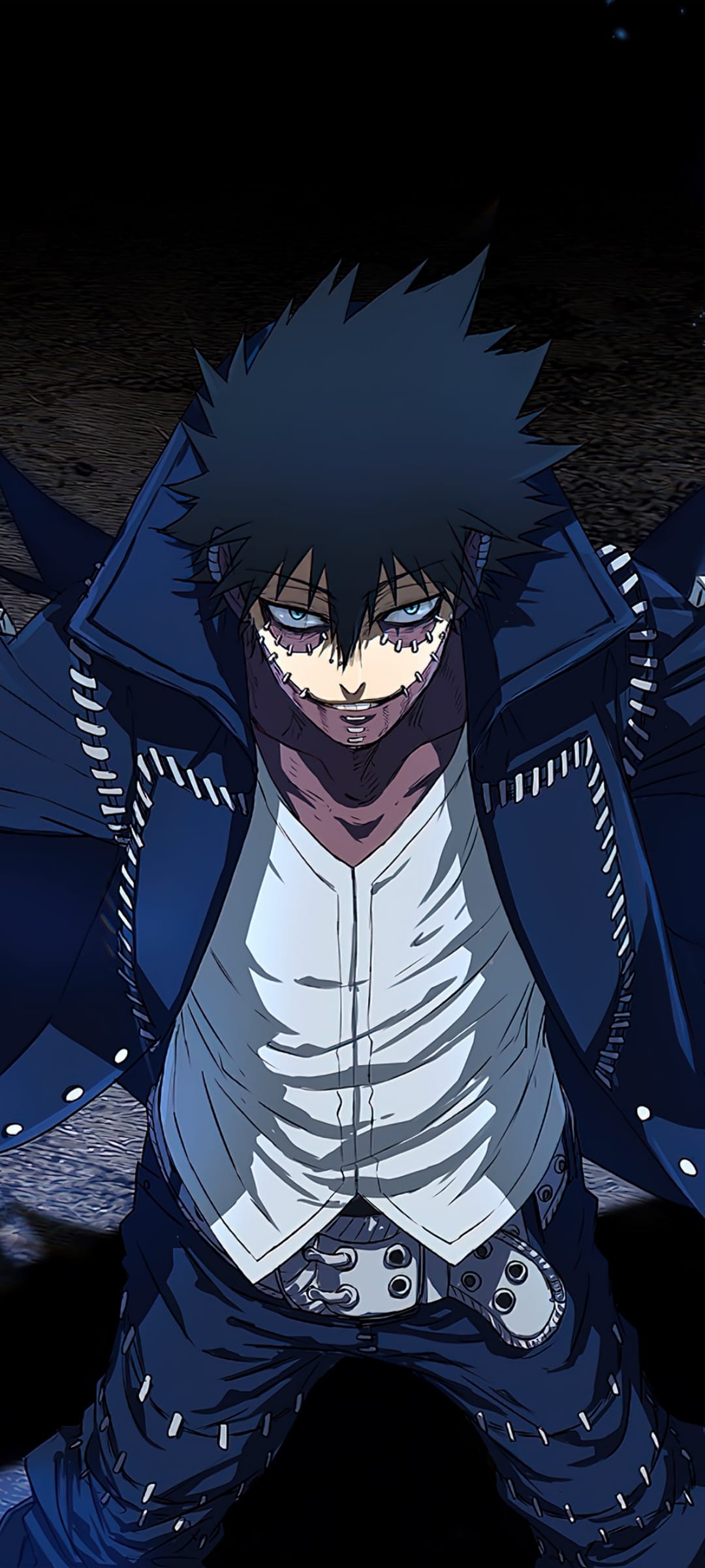 Dabi with stapled skin and blue eyes stares intensely, wearing a dark jacket and white shirt against a dim backdrop.