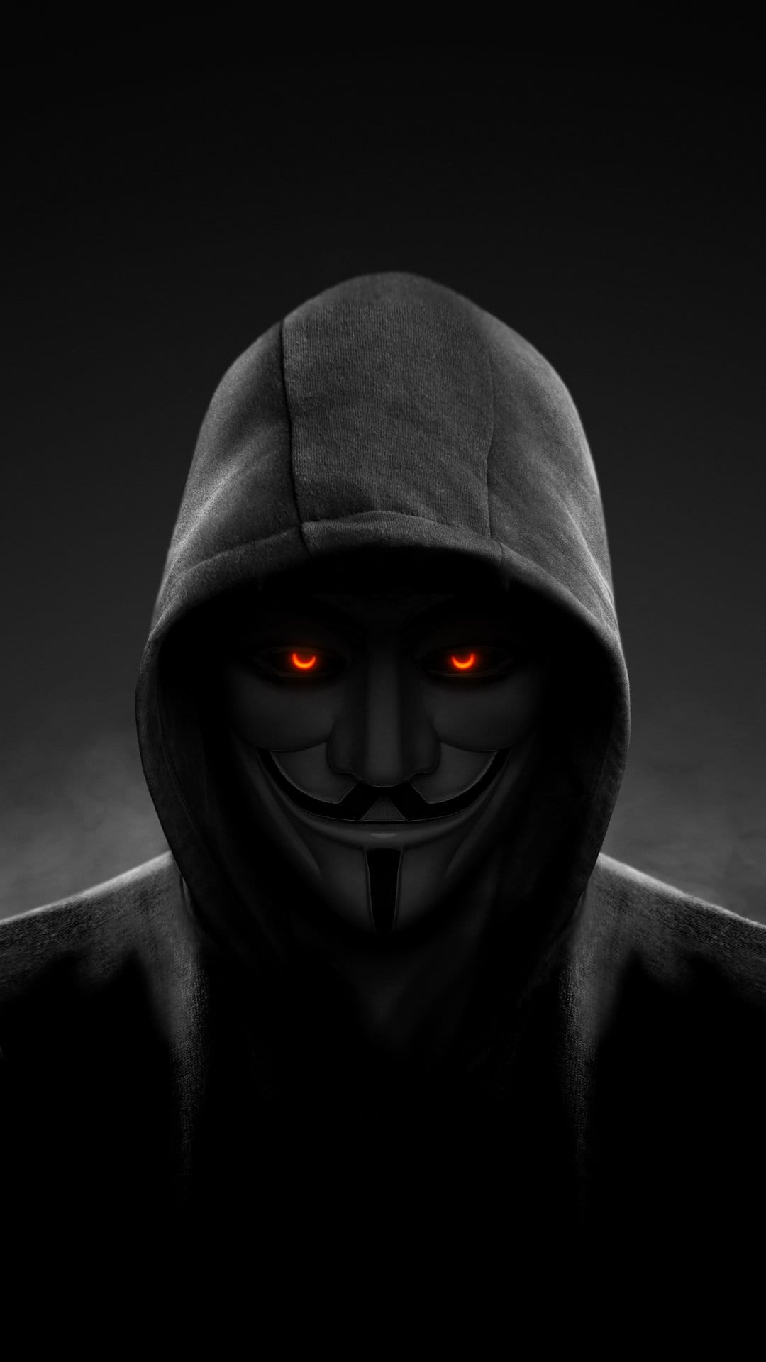 Anonymous mask featuring glowing red eyes and a dark hoodie stands against a hazy, smoke-filled backdrop.
