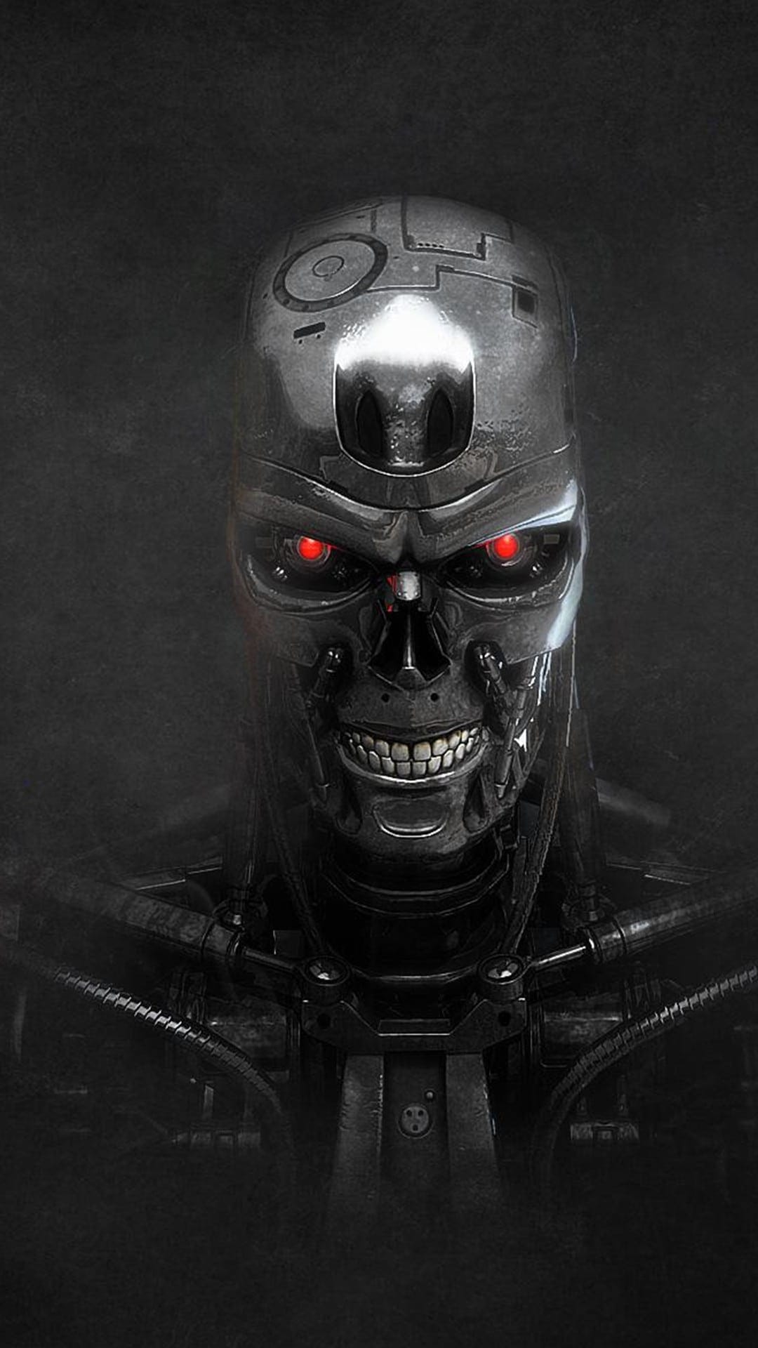 T-800 mechanical skull with glowing red eyes and polished chrome teeth set against a dark, shadowy background.