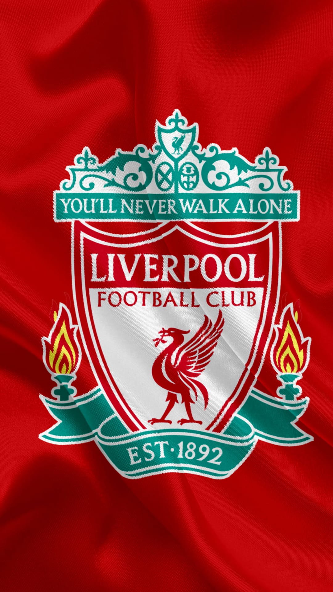 Liverpool FC crest with the Liver bird on a waving red fabric background featuring textured folds and shadows.