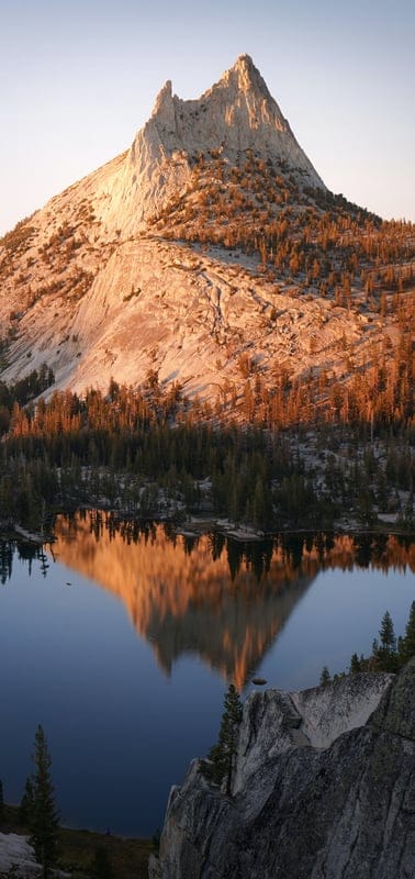 Yosemite, California, sunrise, golden light, Cathedral Peak, lake reflection, tranquil, granite, mountains, National Park, peaceful, nature, wilderness, scenic, outdoor, rock formations, USA, iconic, dawn, landscape