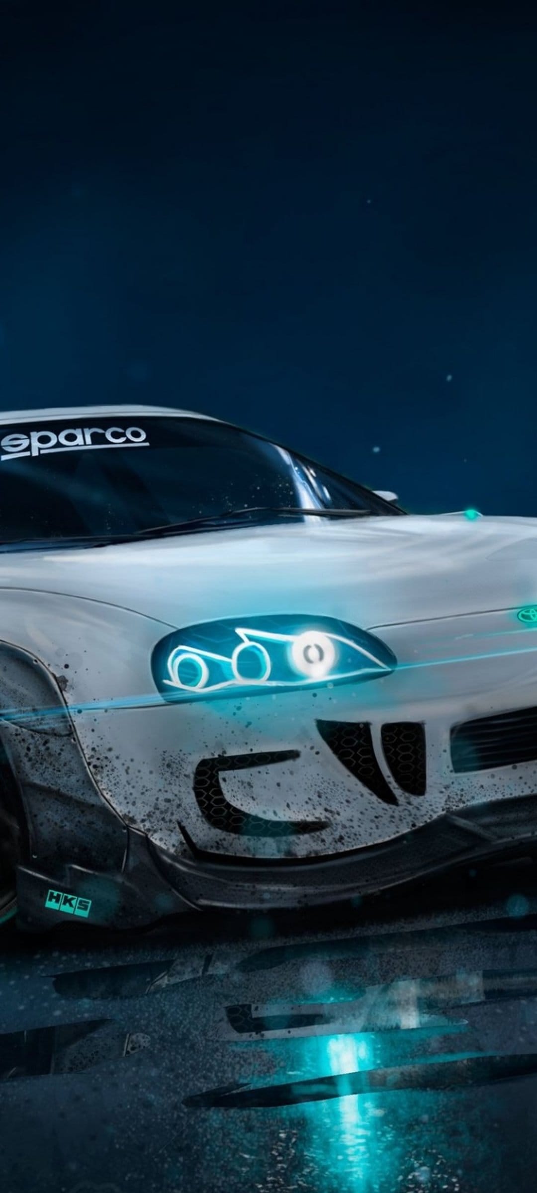 White Toyota Supra with glowing cyan headlights, Sparco sticker, and HKS decal reflecting in a dark wet puddle.