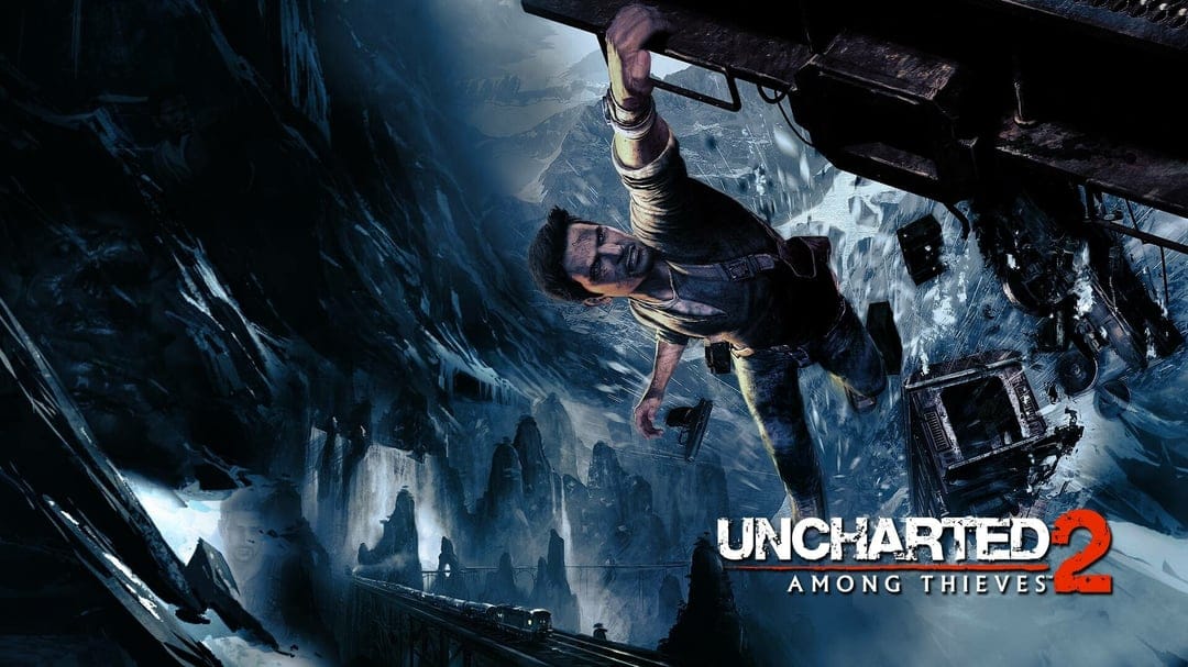 Nathan Drake clings to a derailed train car dangling over a snowy mountain abyss in this Uncharted 2 scene.