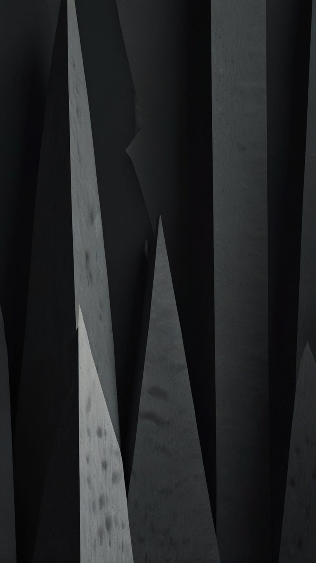 Angular black polygons with faint dusty textures overlap in a shadowed vertical geometric composition.
