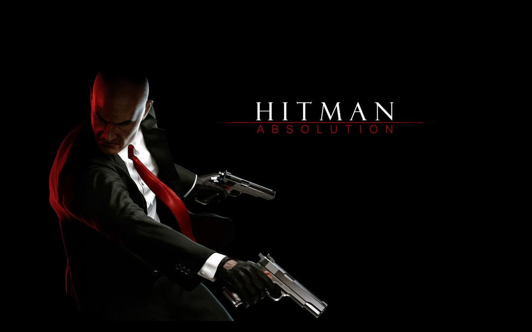 Agent 47 wearing a black suit and red tie, dual-wielding silver pistols against a dark black background.